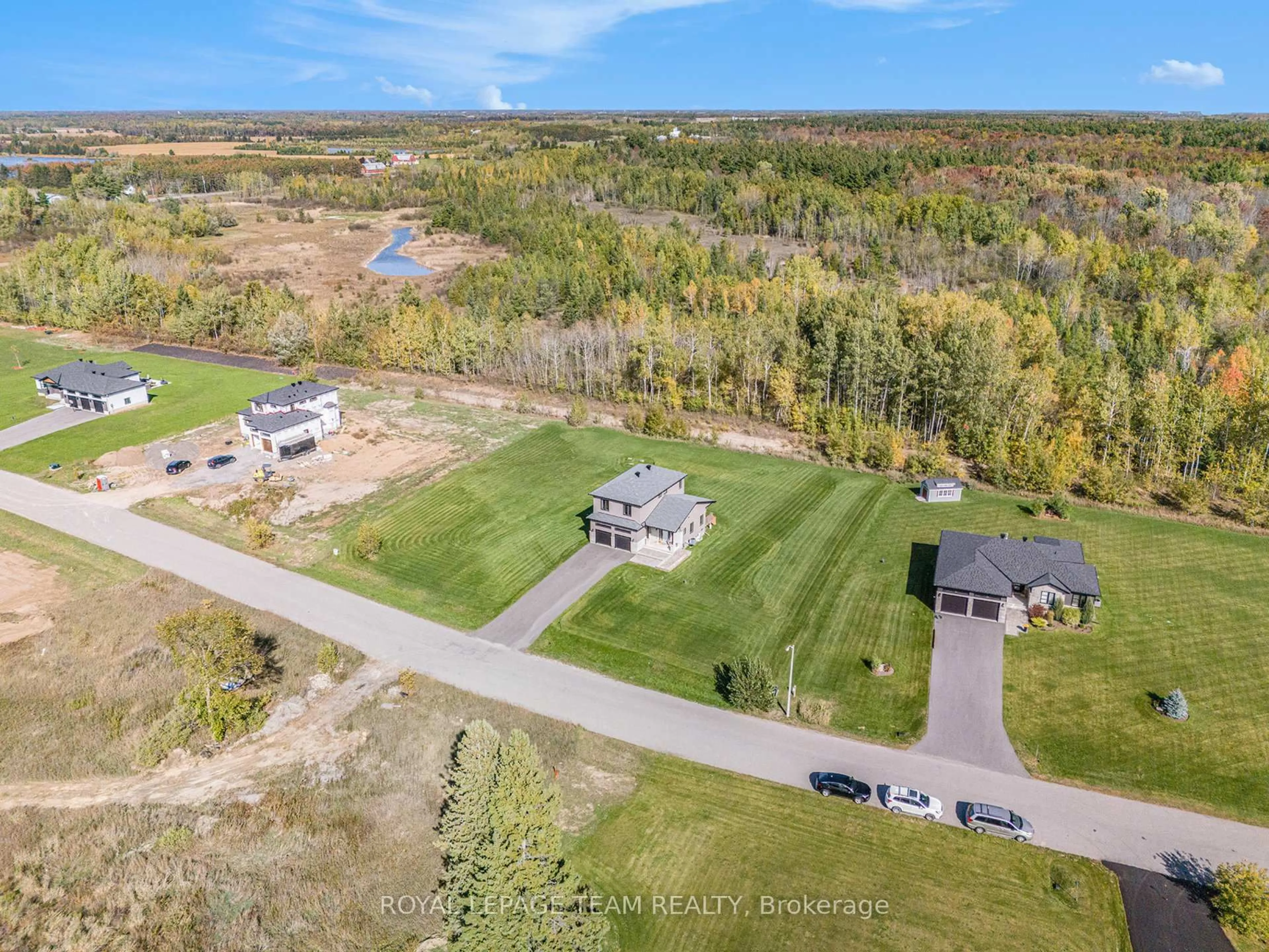 A pic from outside/outdoor area/front of a property/back of a property/a pic from drone, water/lake/river/ocean view for 114 Maplestone Dr, North Grenville Ontario K0G 1J0