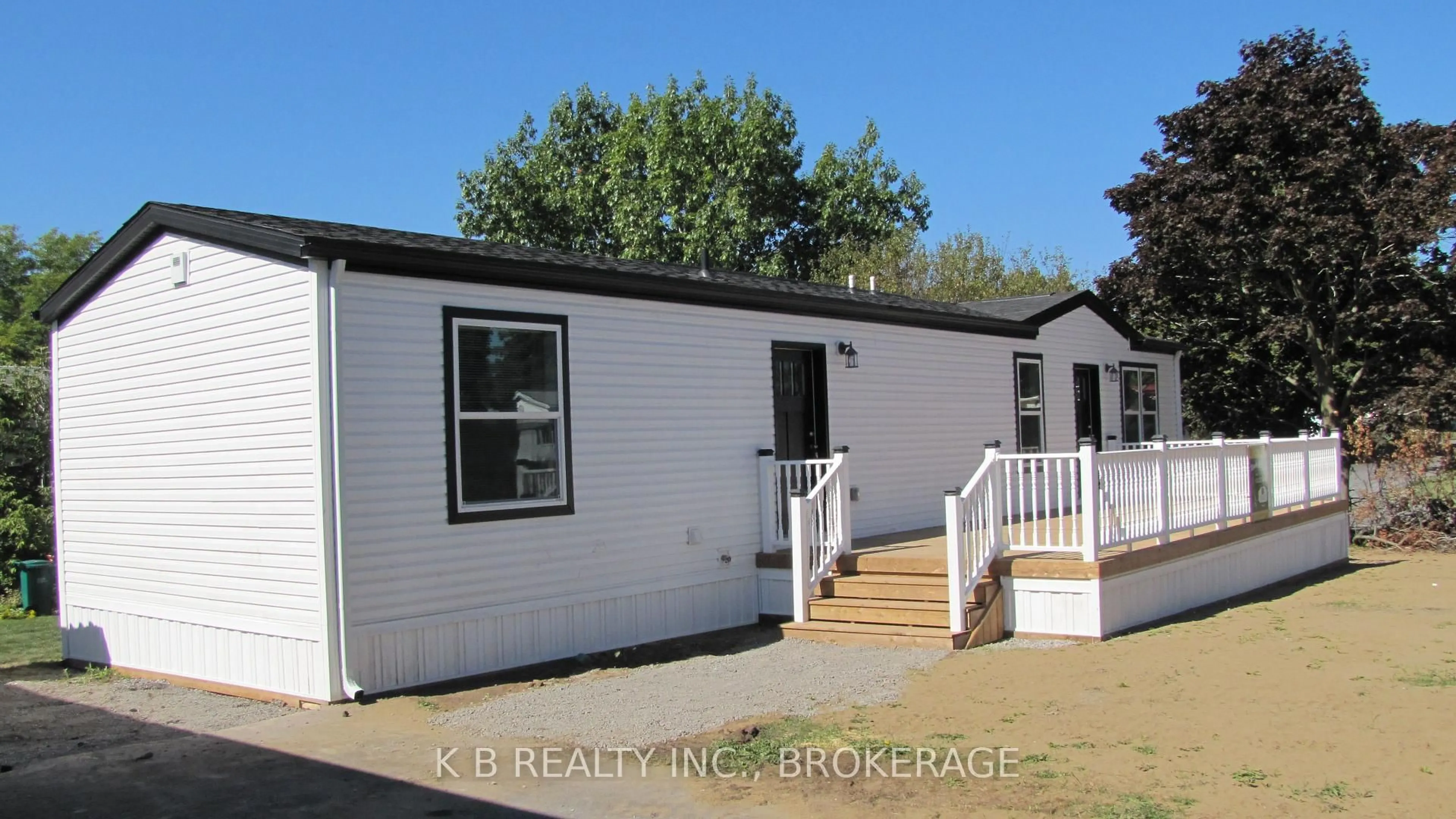 Home with vinyl exterior material, street for 1 Parkington Pl #., Kingston Ontario K7K 5C7