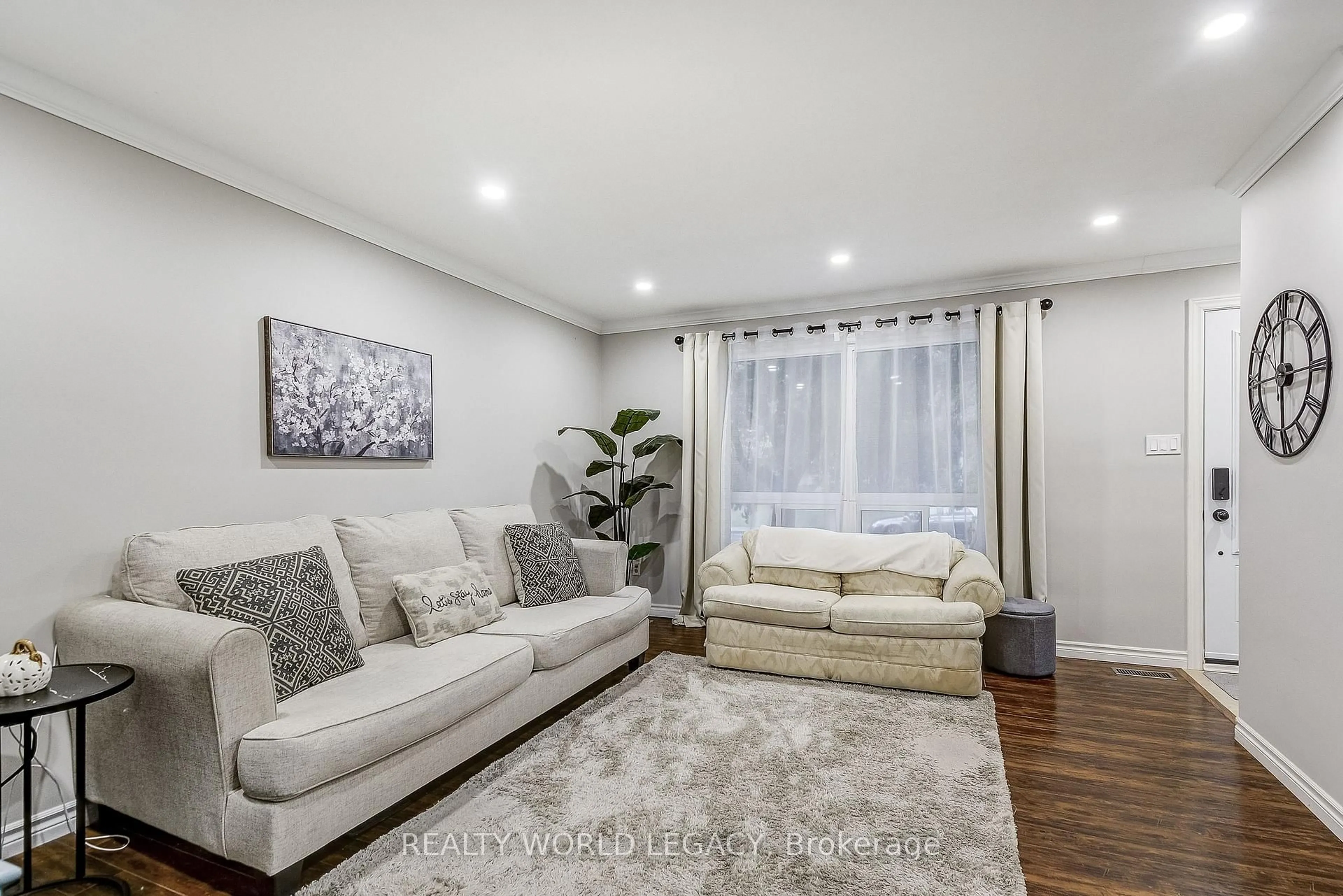 Living room with furniture, unknown for 132 Barlake Ave #35, Hamilton Ontario L8E 1H3