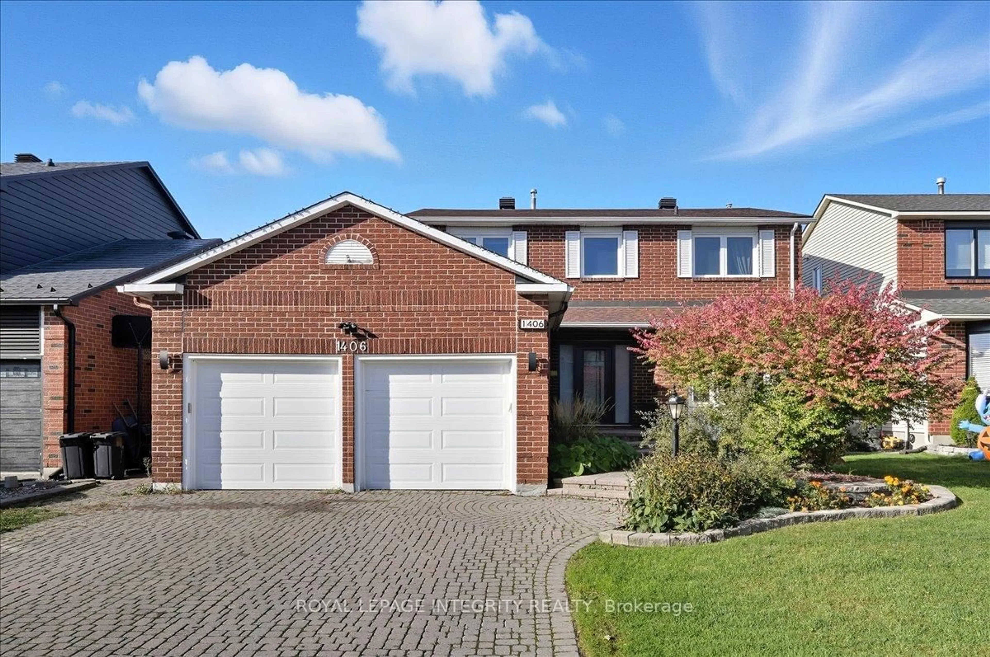 Home with brick exterior material, street for 1406 Bouton D'or Way, Ottawa Ontario K1E 3L3