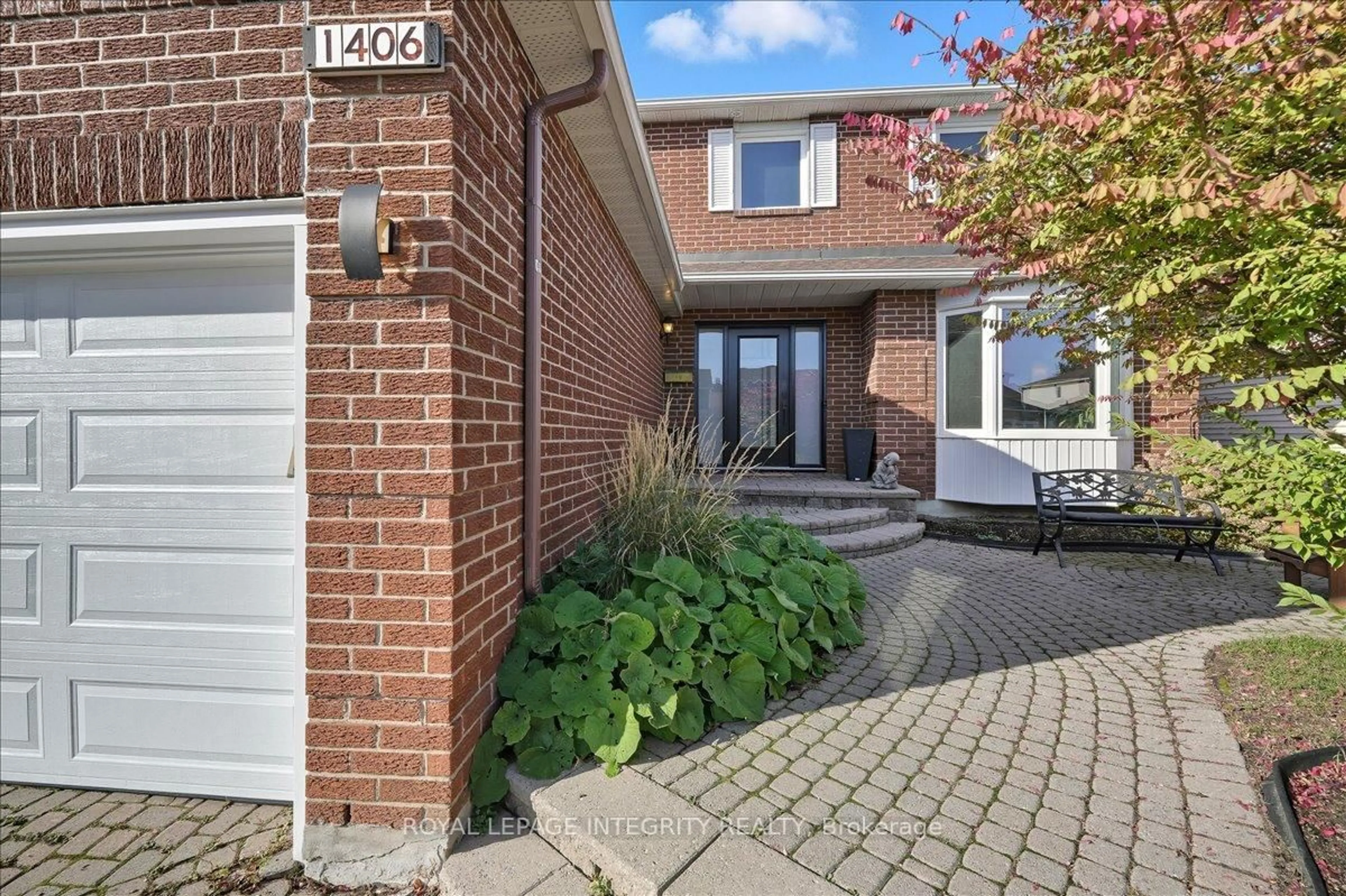 Home with brick exterior material, street for 1406 Bouton D'or Way, Ottawa Ontario K1E 3L3