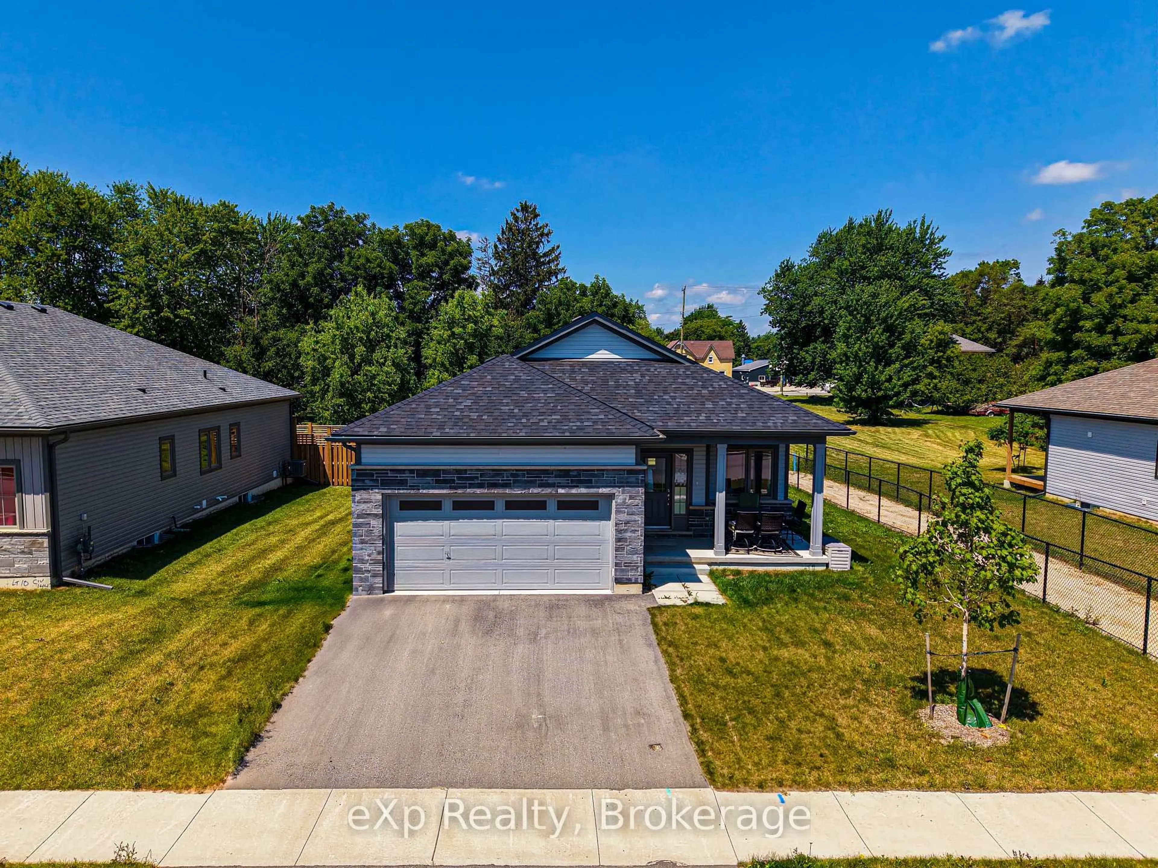 A pic from outside/outdoor area/front of a property/back of a property/a pic from drone, street for 142 Ellen St, North Perth Ontario N0G 1B0