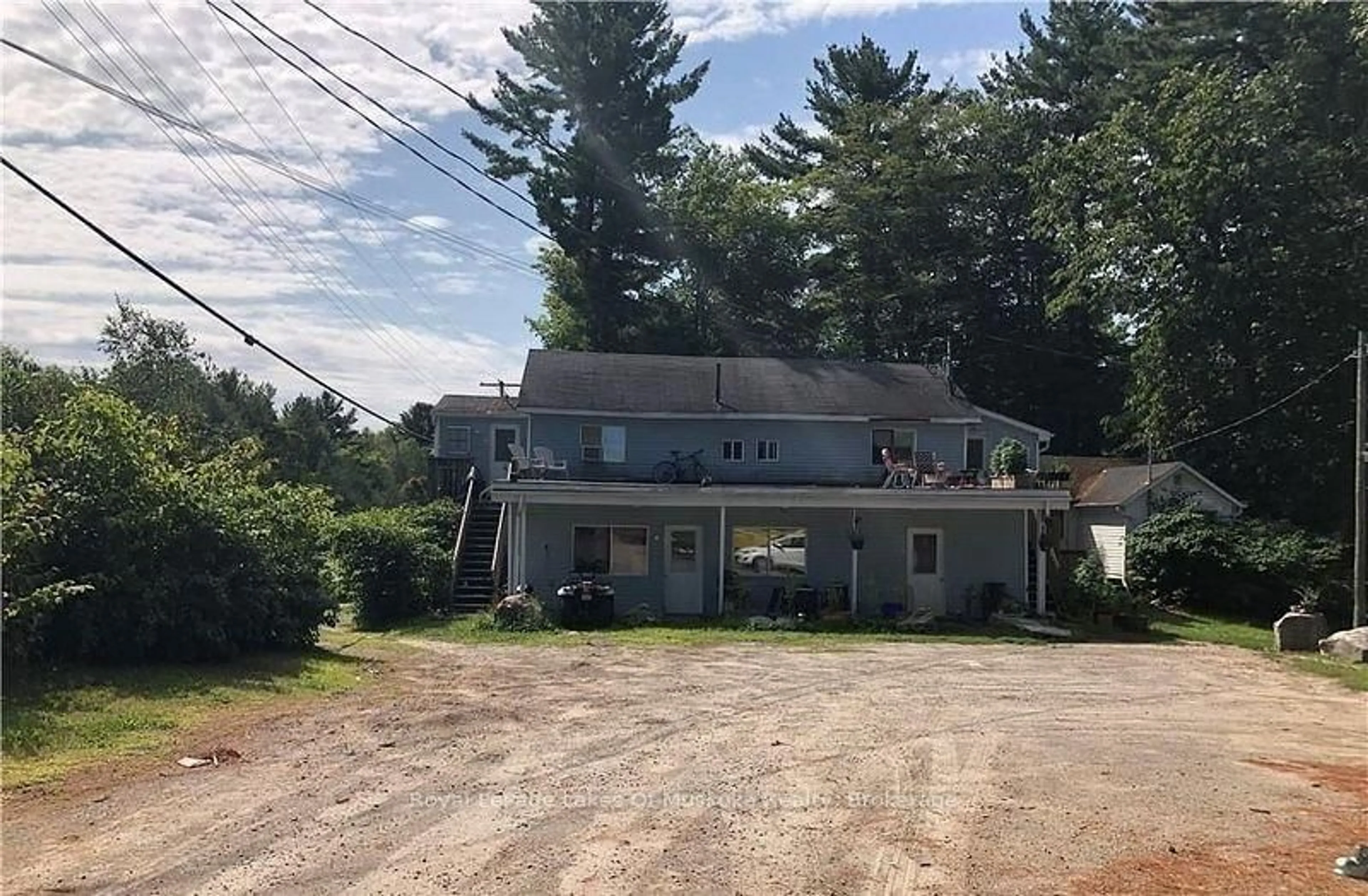 A pic from outside/outdoor area/front of a property/back of a property/a pic from drone, street for 4019 MUSKOKA 169 Rd, Muskoka Lakes Ontario P0C 1A0