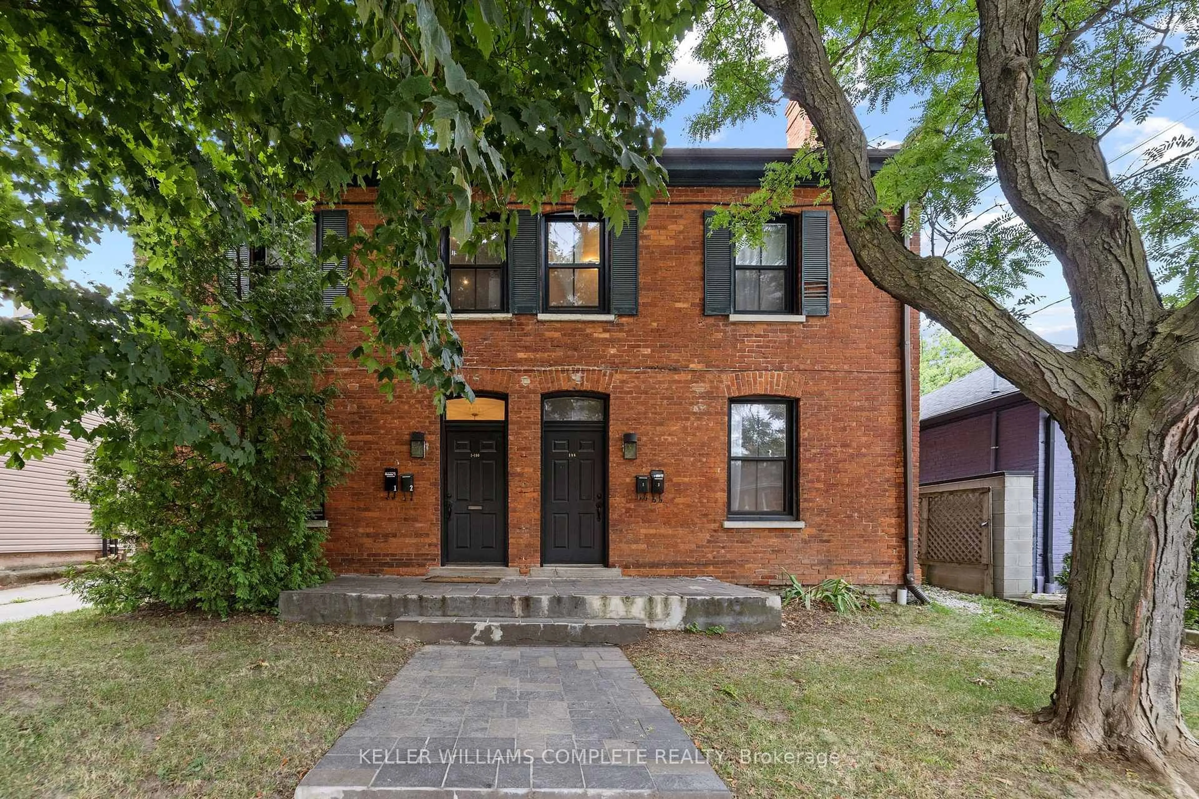 Home with brick exterior material, street for 188-190 Caroline St, Hamilton Ontario L8P 3L2