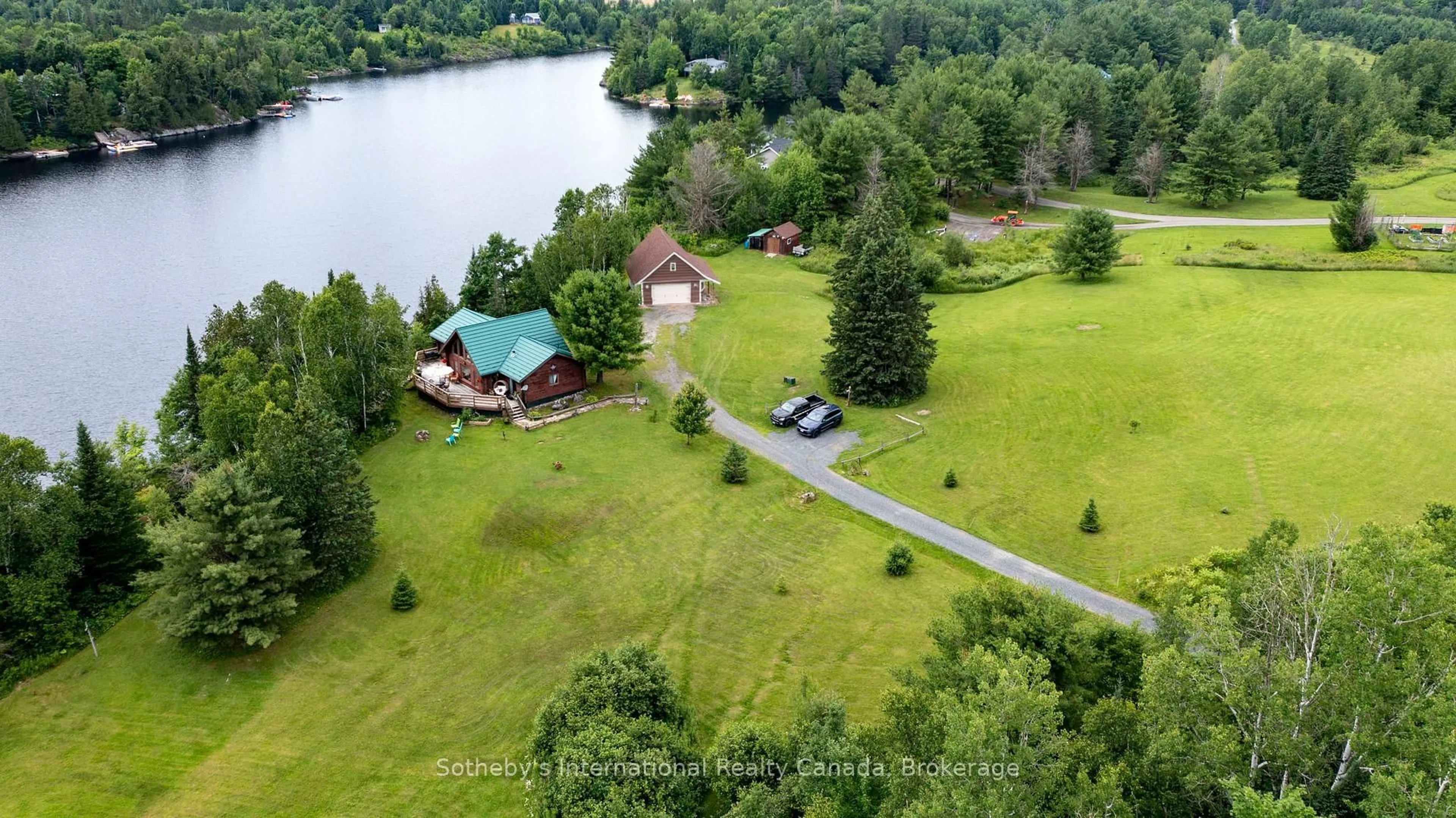 A pic from outside/outdoor area/front of a property/back of a property/a pic from drone, water/lake/river/ocean view for 20 Kodiak Rd, McKellar Ontario P0G 1G0