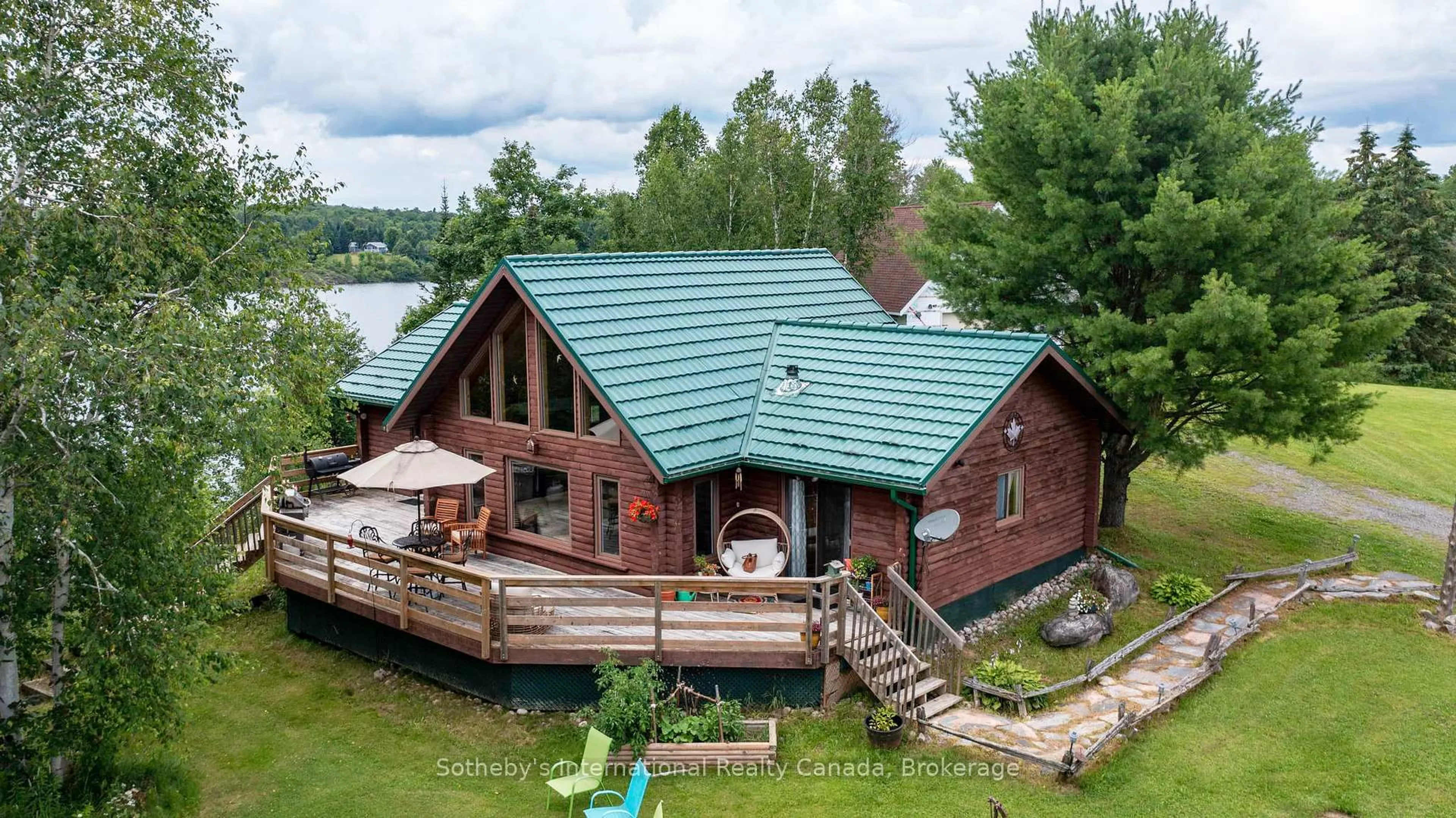 A pic from outside/outdoor area/front of a property/back of a property/a pic from drone, water/lake/river/ocean view for 20 Kodiak Rd, McKellar Ontario P0G 1G0