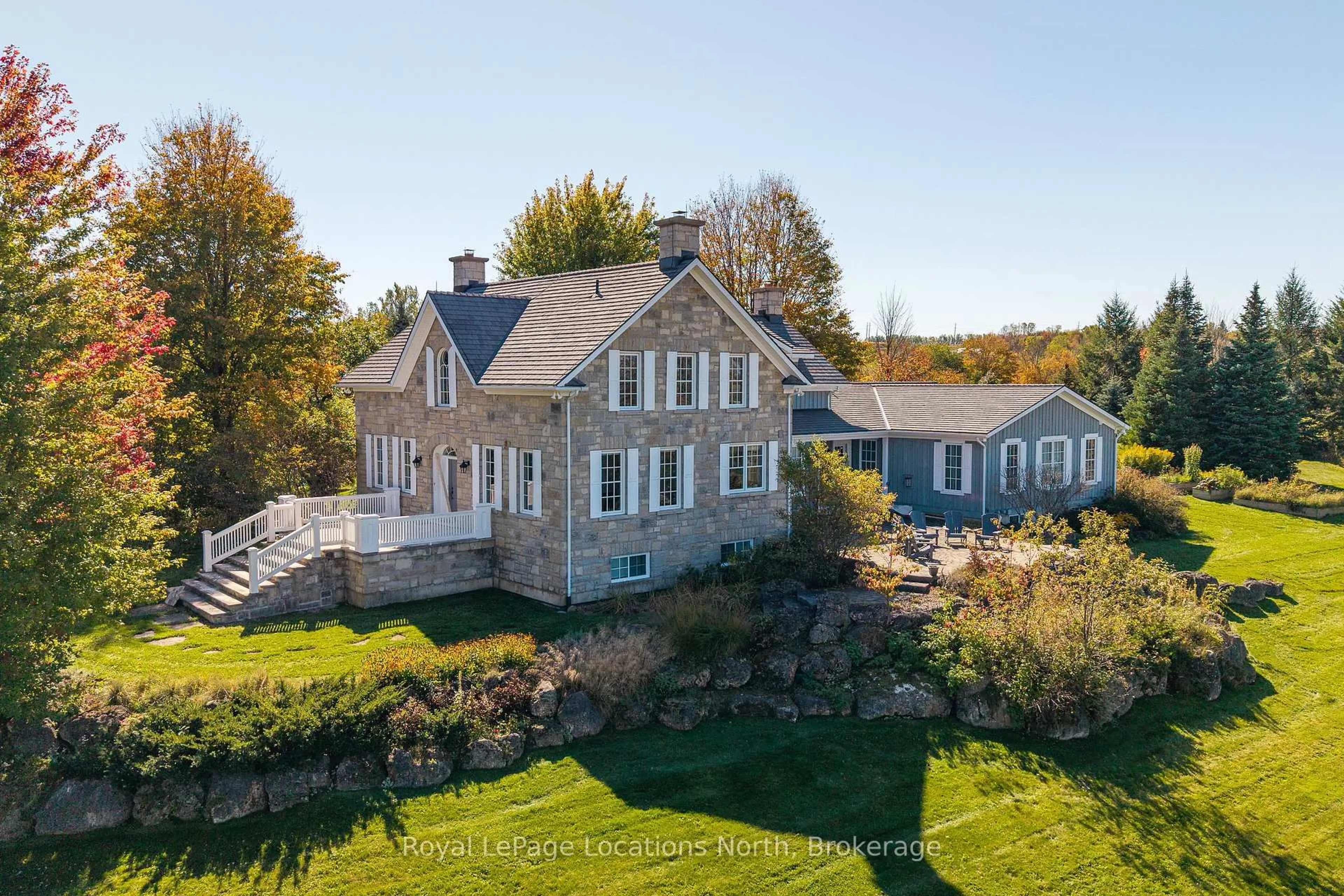 A pic from outside/outdoor area/front of a property/back of a property/a pic from drone, water/lake/river/ocean view for 556036 6th Line, Blue Mountains Ontario N0H 1J0