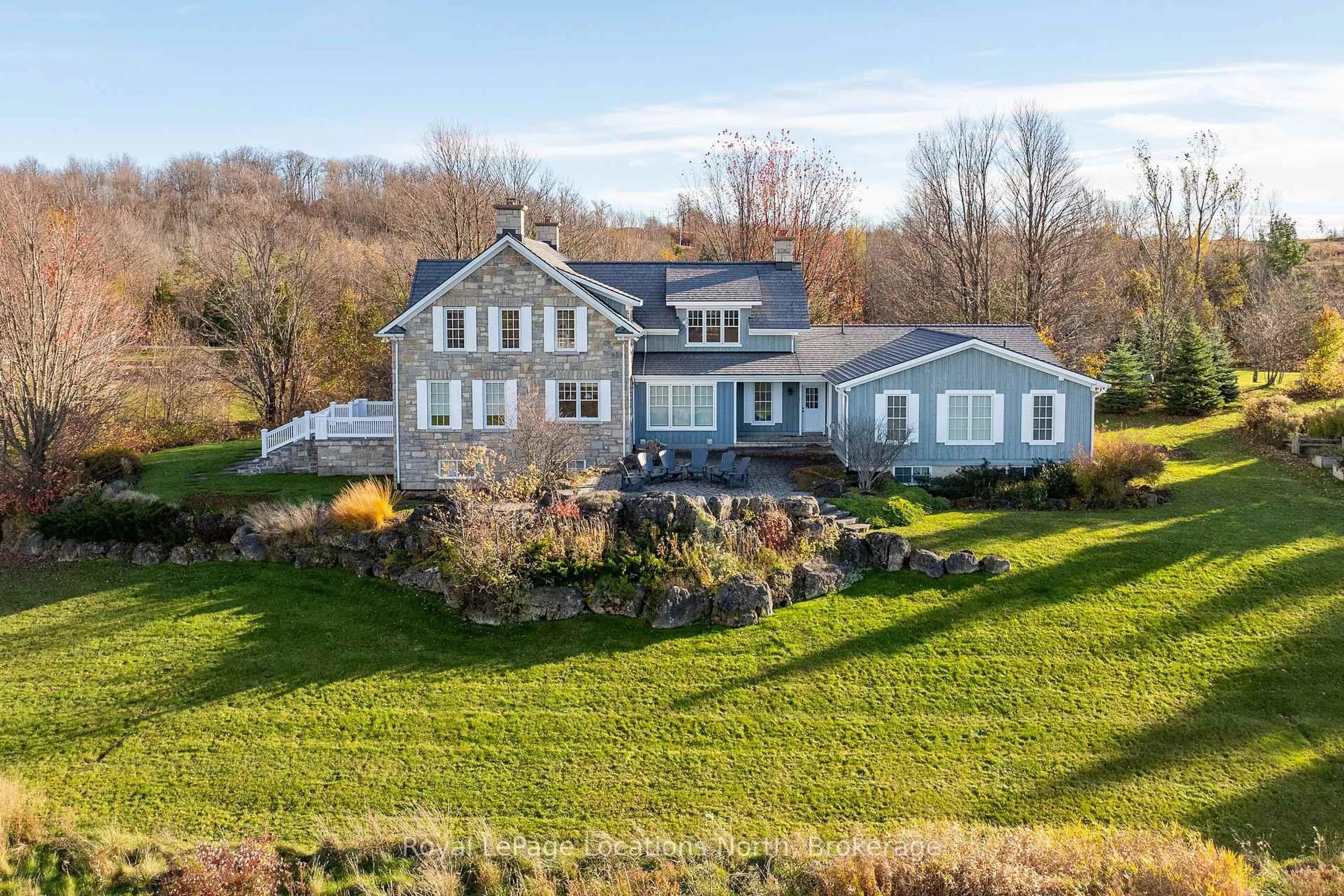 A pic from outside/outdoor area/front of a property/back of a property/a pic from drone, water/lake/river/ocean view for 556036 6th Line, Blue Mountains Ontario N0H 1J0