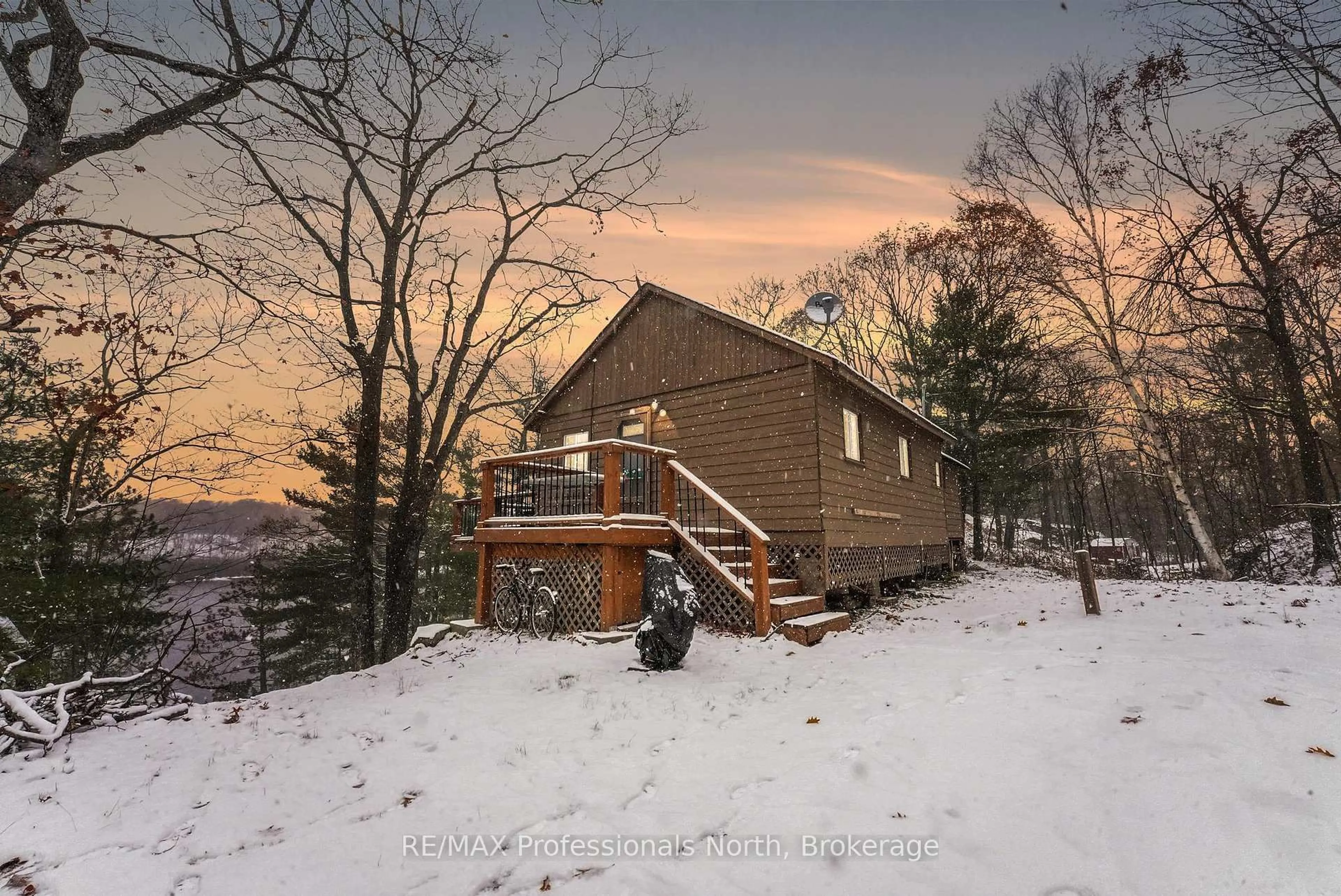 A pic from outside/outdoor area/front of a property/back of a property/a pic from drone, mountain view for 1012 Iroquois Lane, Minden Hills Ontario K0M 2K0
