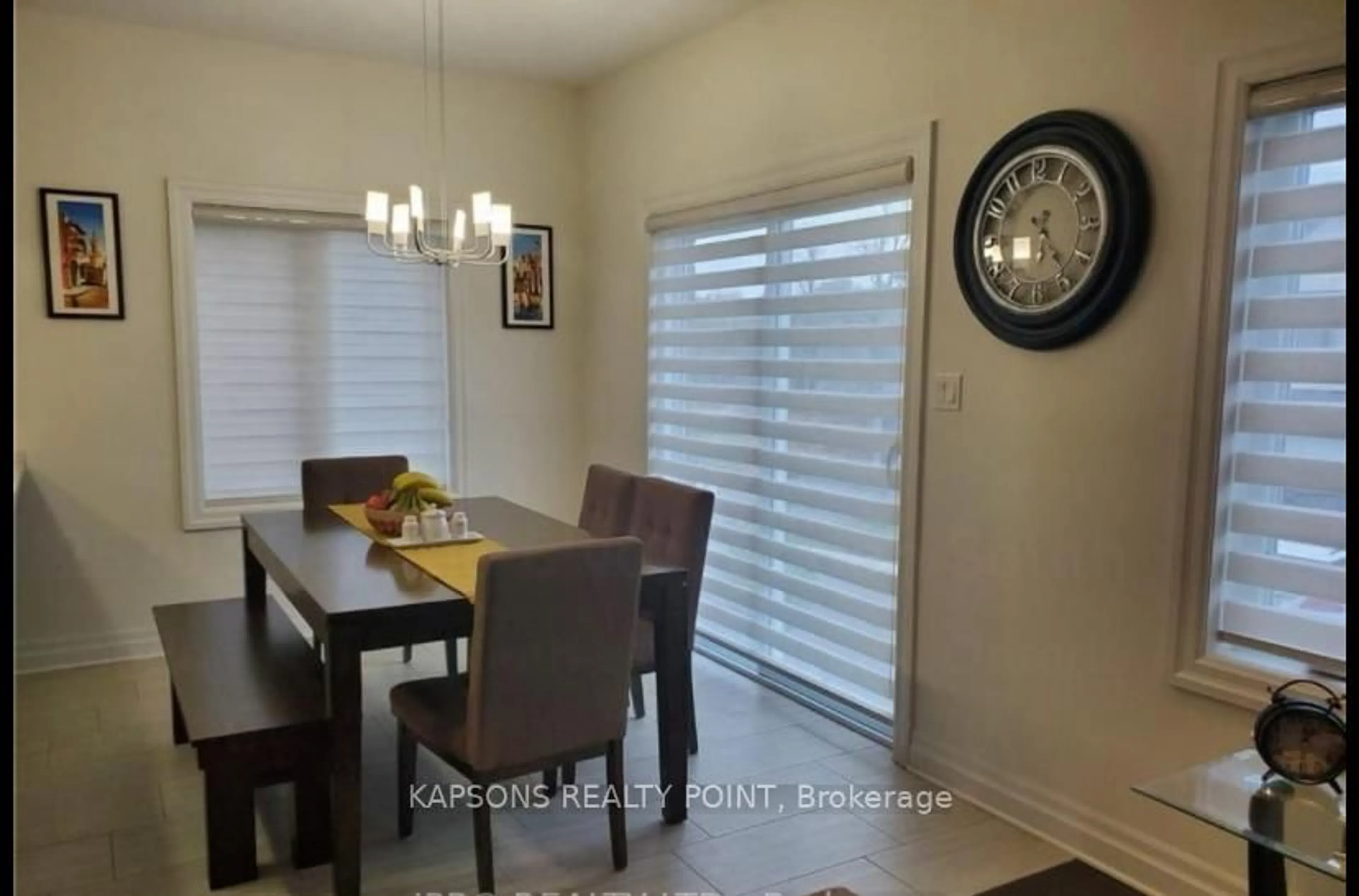 Dining room, wood/laminate floor for 2579 Sheffield Blvd #21, London South Ontario N6M 0G4