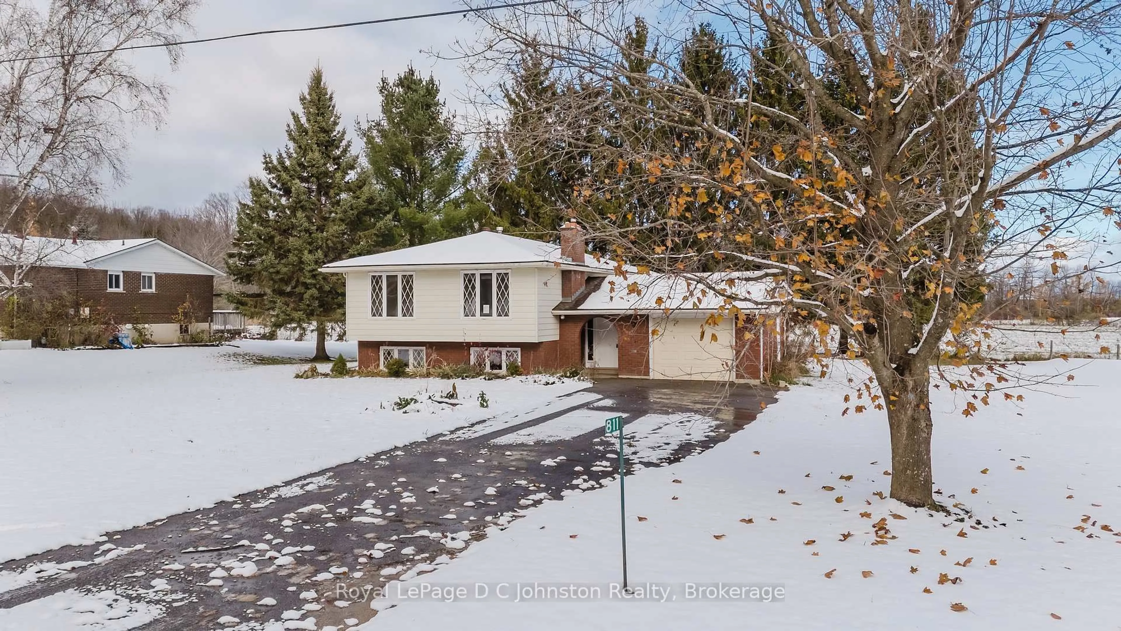 A pic from outside/outdoor area/front of a property/back of a property/a pic from drone, street for 811 30th St, Georgian Bluffs Ontario N4K 6V5