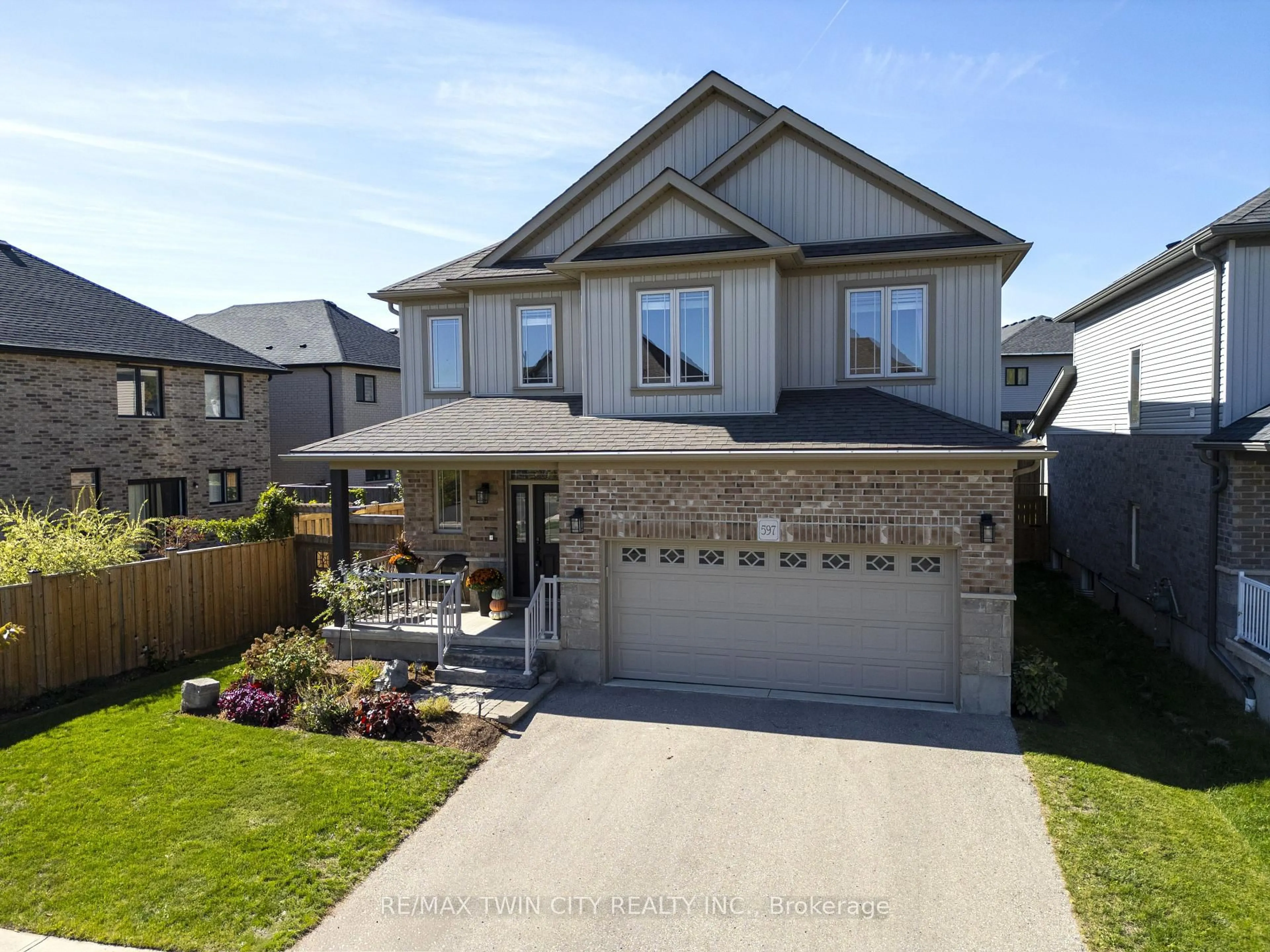 Home with brick exterior material, street for 597 Sundew Dr, Waterloo Ontario N2V 0B9
