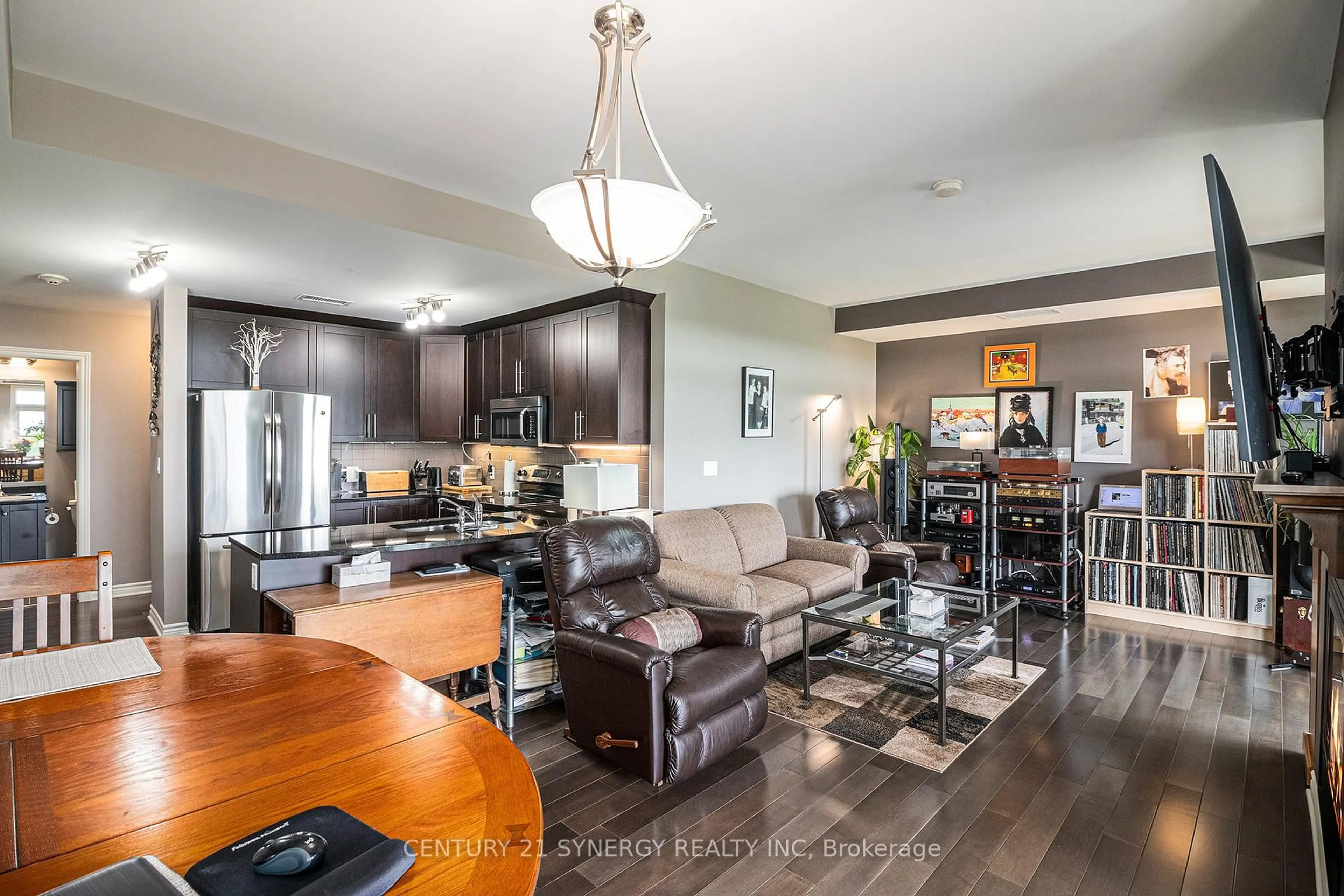 Open concept kitchen, wood/laminate floor for 10 Prestige Circ #7, Ottawa Ontario K4A 0W9