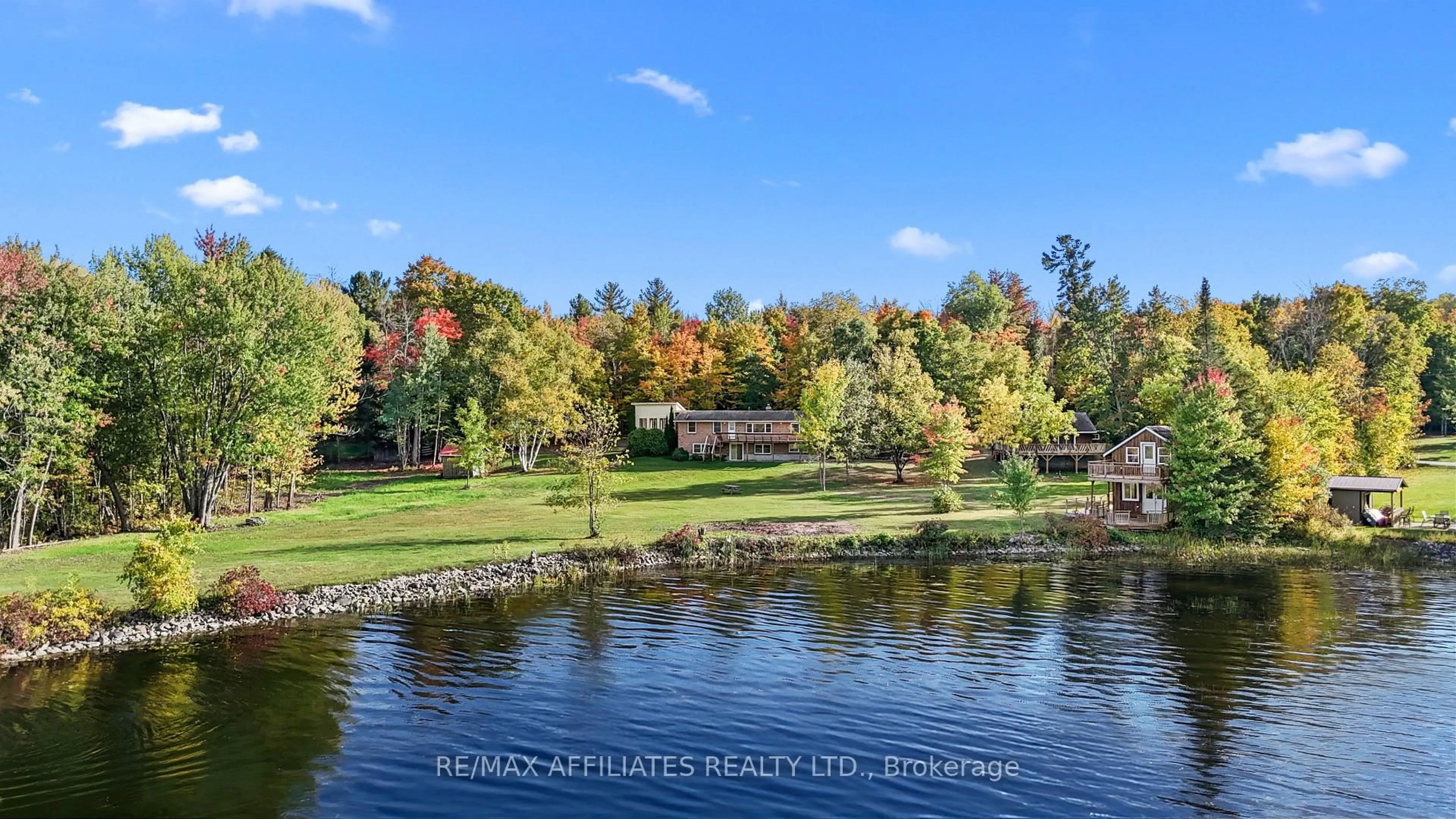 A pic from outside/outdoor area/front of a property/back of a property/a pic from drone, water/lake/river/ocean view for 326 Black Bass Bay Rd, Perth Ontario K7C 3C8