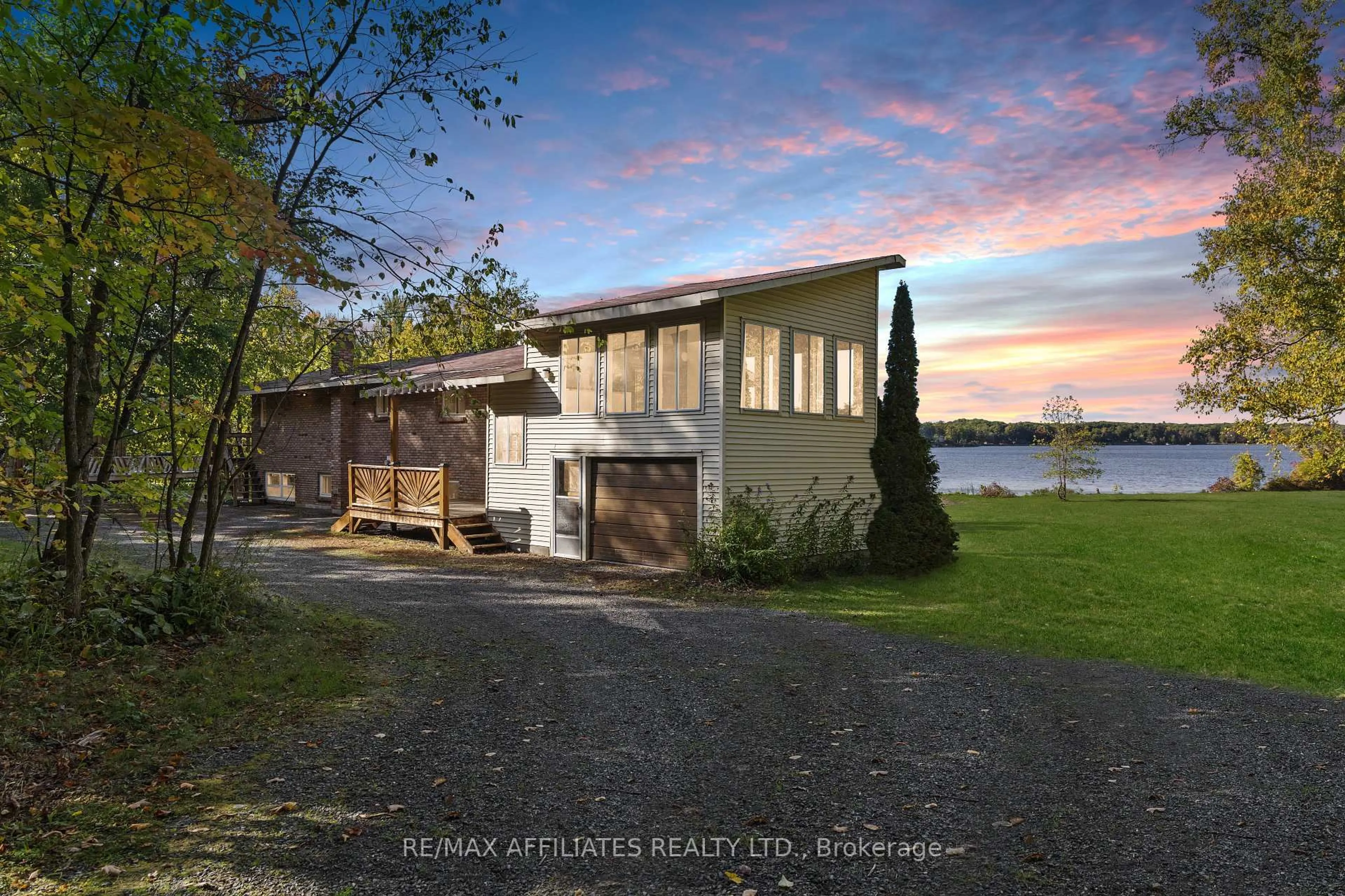 A pic from outside/outdoor area/front of a property/back of a property/a pic from drone, water/lake/river/ocean view for 326 Black Bass Bay Rd, Perth Ontario K7C 3C8