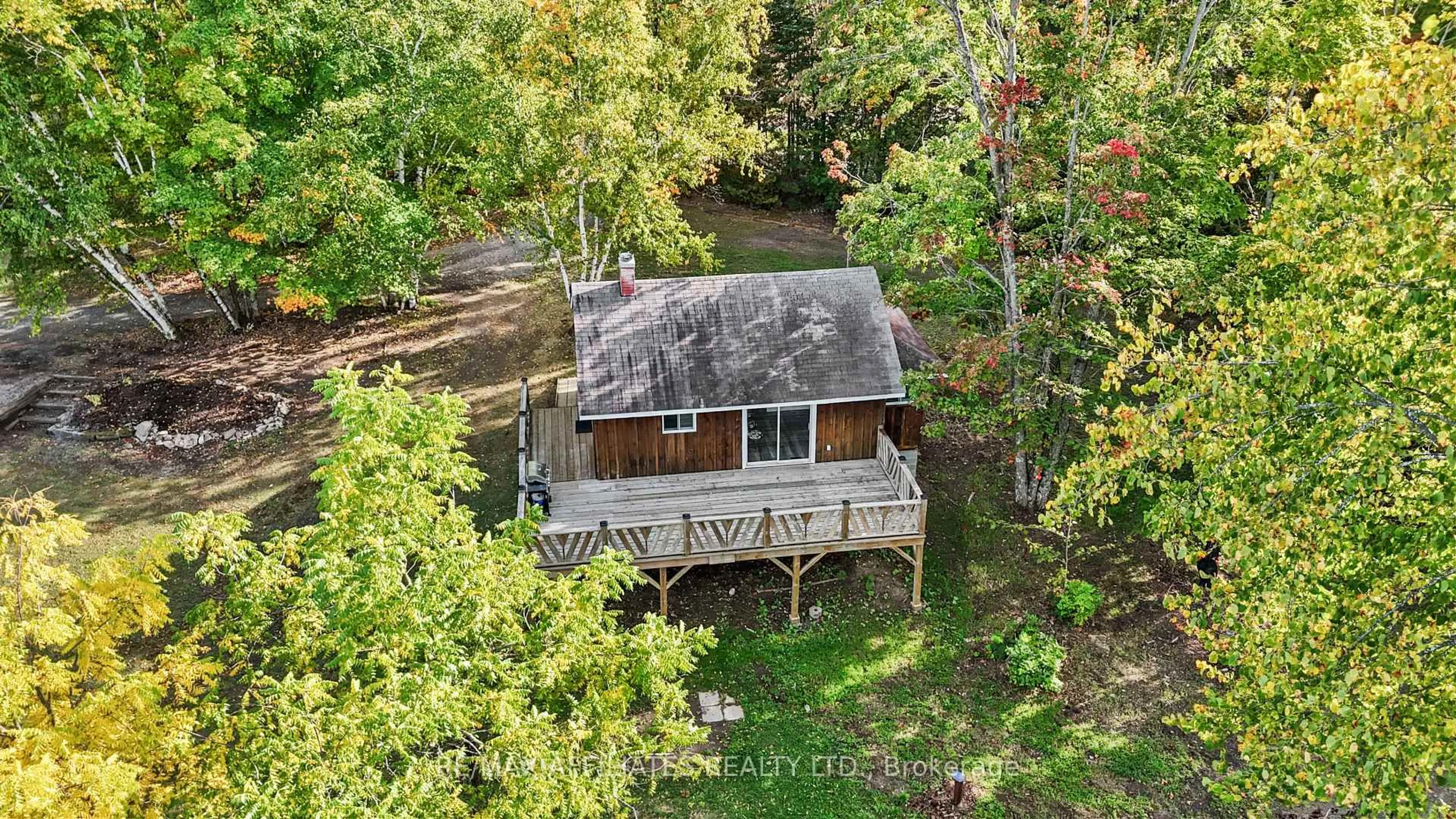 A pic from outside/outdoor area/front of a property/back of a property/a pic from drone, water/lake/river/ocean view for 326 Black Bass Bay Rd, Perth Ontario K7C 3C8