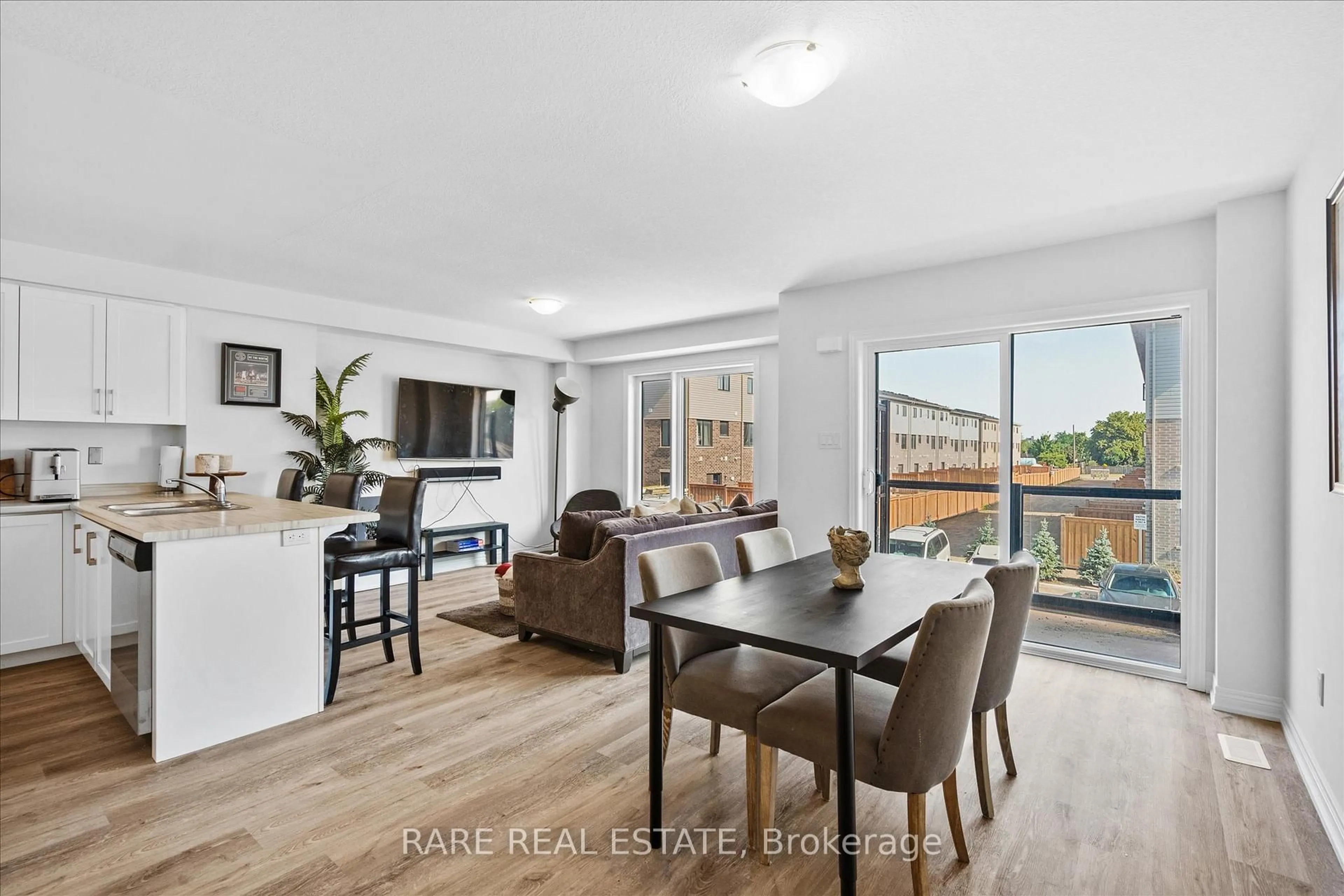 Living room with furniture, wood/laminate floor for 112 Dryden Lane, Hamilton Ontario L8H 1L9