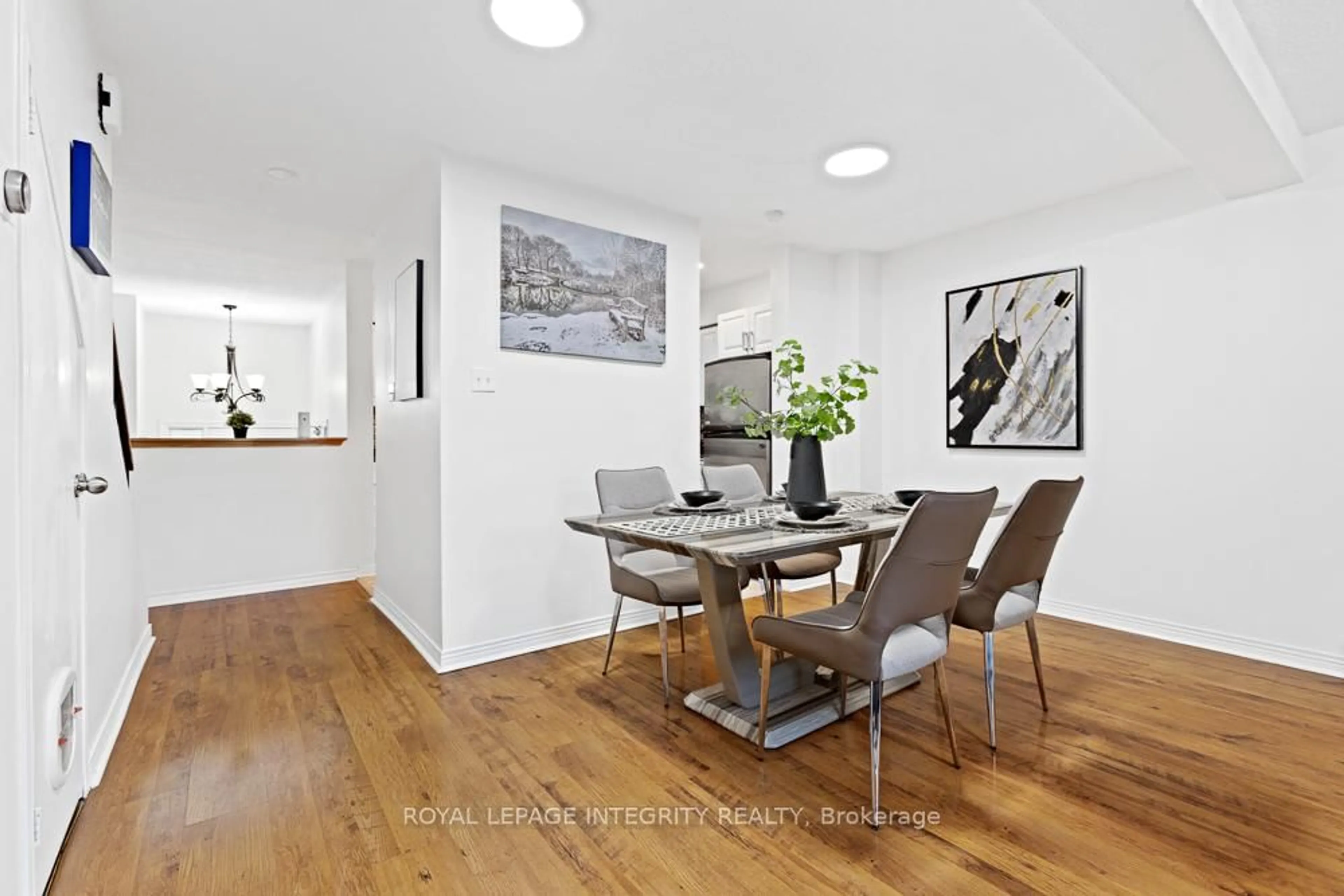 Dining room, wood/laminate floor for 498 Sandhamn Private, Ottawa Ontario K1T 2Z6