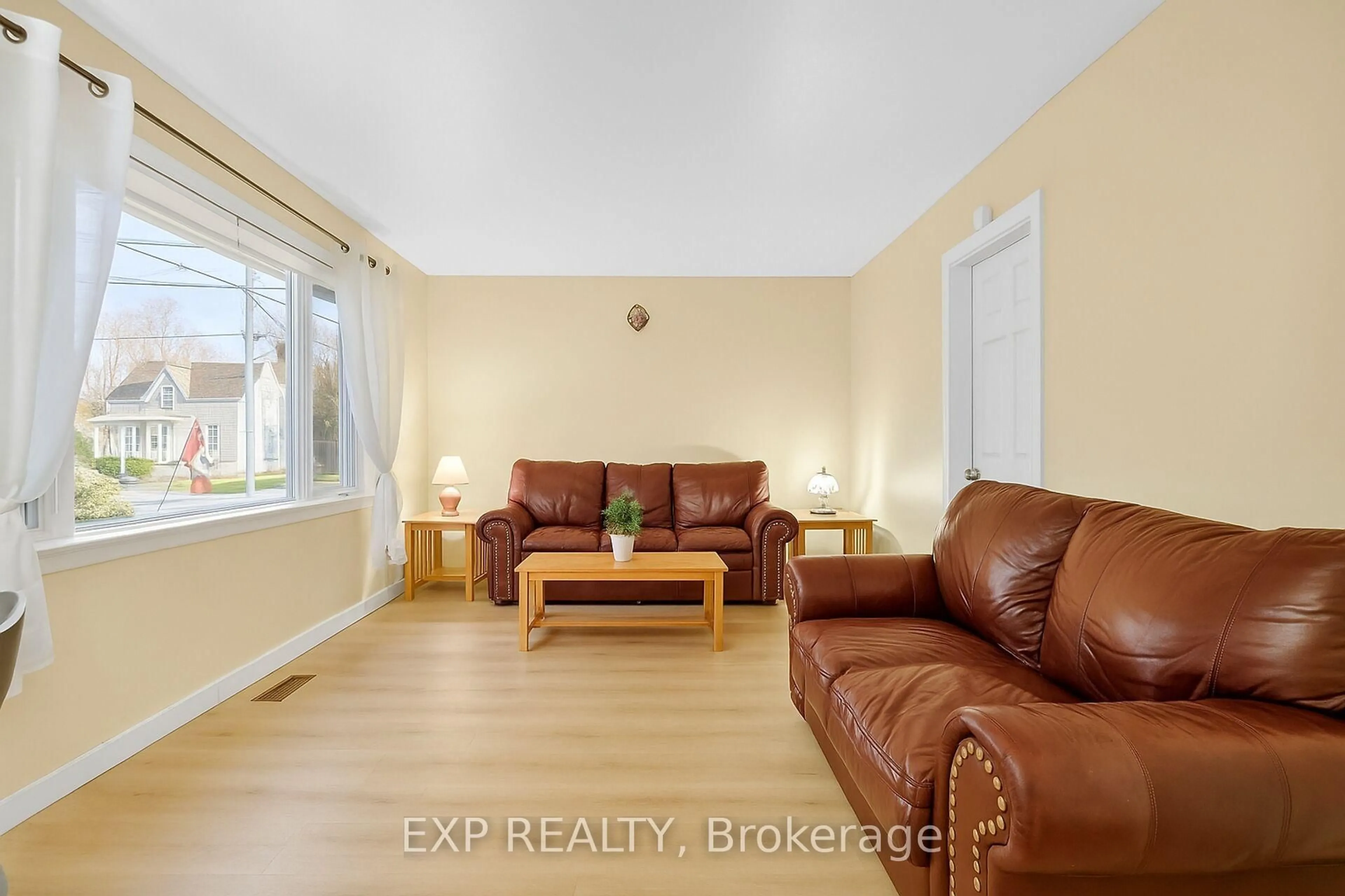 Living room with furniture, wood/laminate floor for 41 HWY 5 W St, South Dundas Ontario K0C 1X0