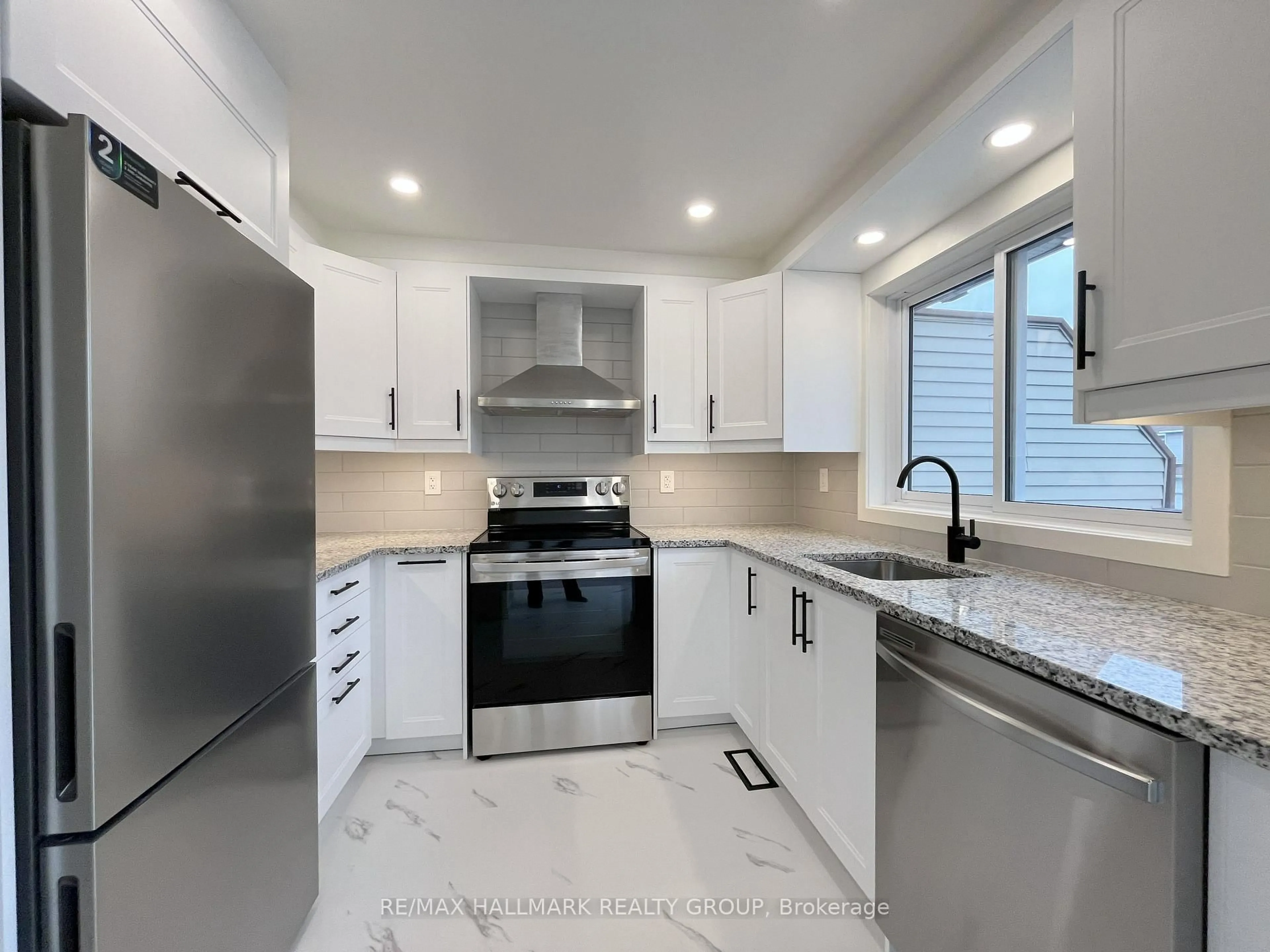 Open concept kitchen, ceramic/tile floor for 94 Esterlawn Private #11, Ottawa Ontario K2A 4C1