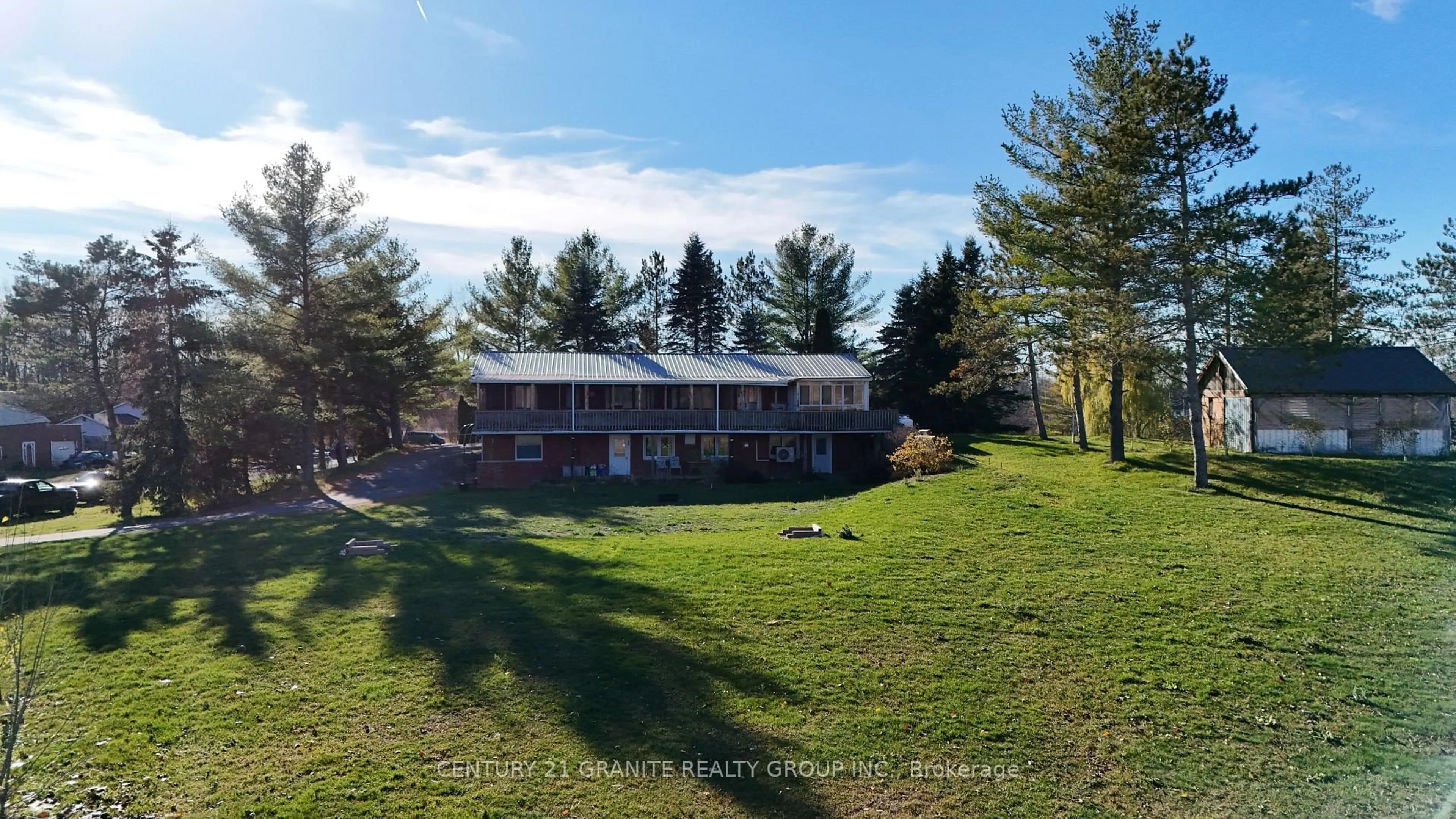 A pic from outside/outdoor area/front of a property/back of a property/a pic from drone, unknown for 15 East Hungerford Rd, Tweed Ontario K0K 3J0
