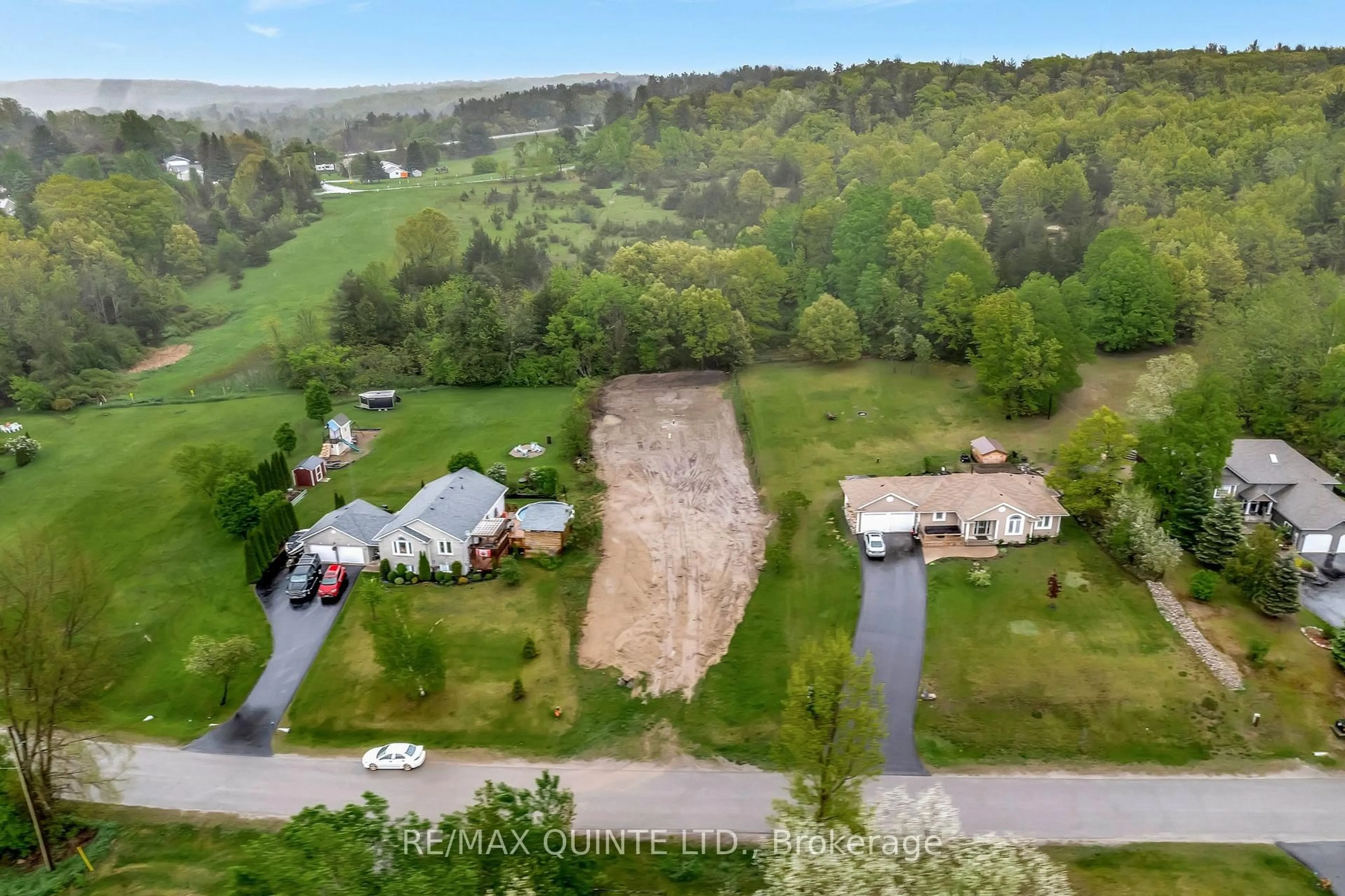 A pic from outside/outdoor area/front of a property/back of a property/a pic from drone, water/lake/river/ocean view for 43b Deerfield Dr, Hastings Ontario K0K 2C0
