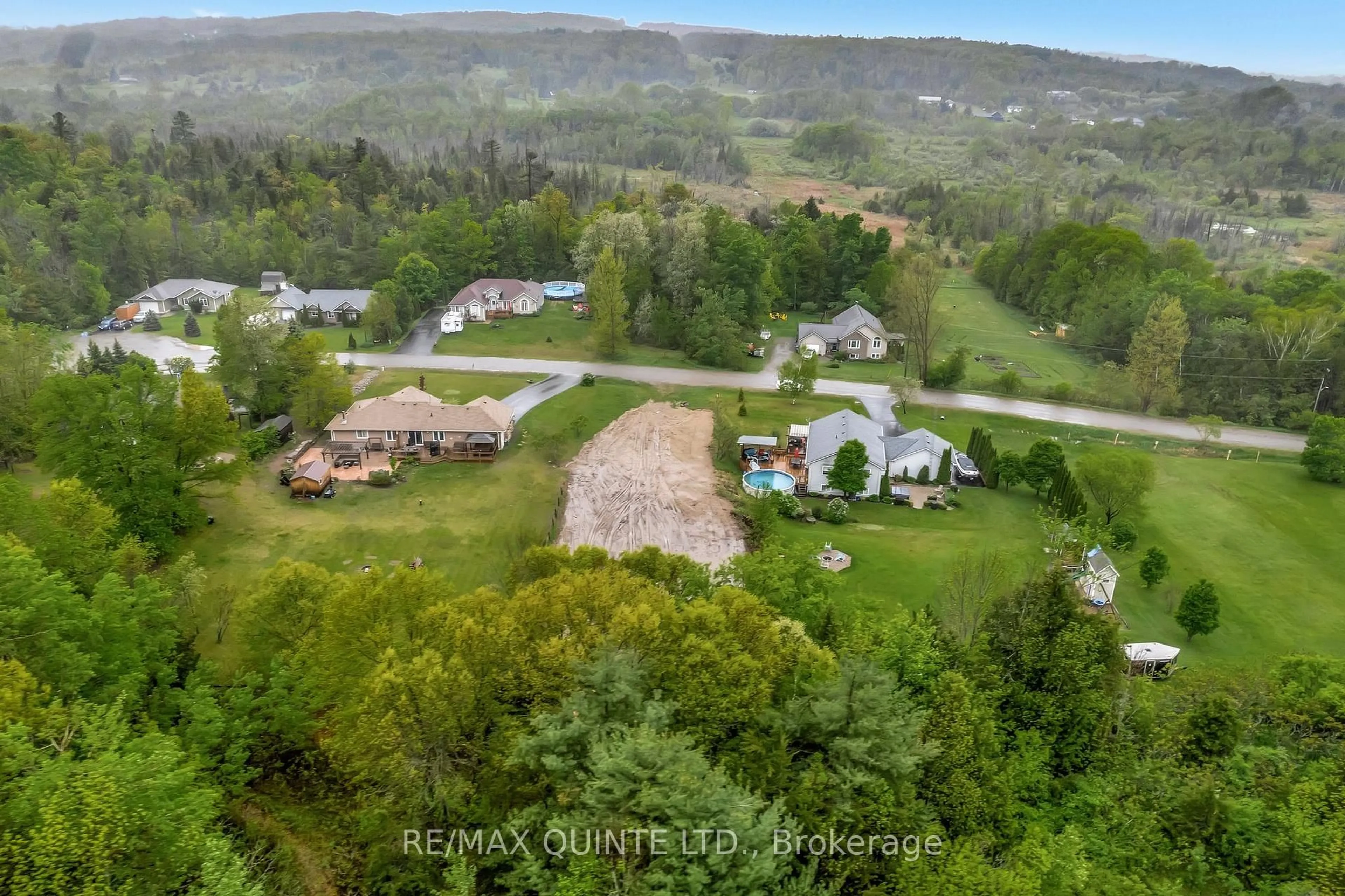 A pic from outside/outdoor area/front of a property/back of a property/a pic from drone, mountain view for 43b Deerfield Dr, Hastings Ontario K0K 2C0