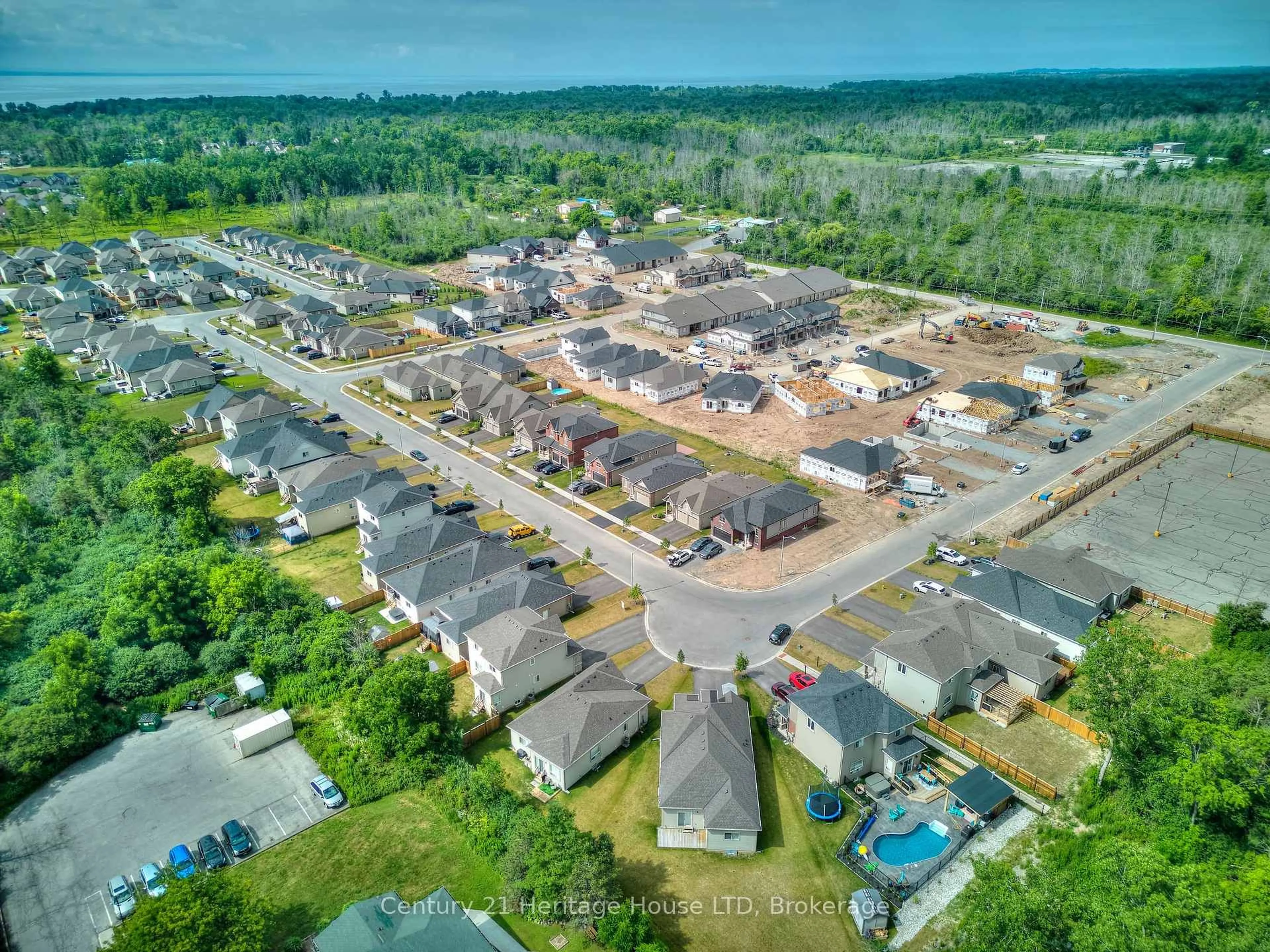 A pic from outside/outdoor area/front of a property/back of a property/a pic from drone, street for 397 Garrison Rd #9, Fort Erie Ontario L2A 1N1