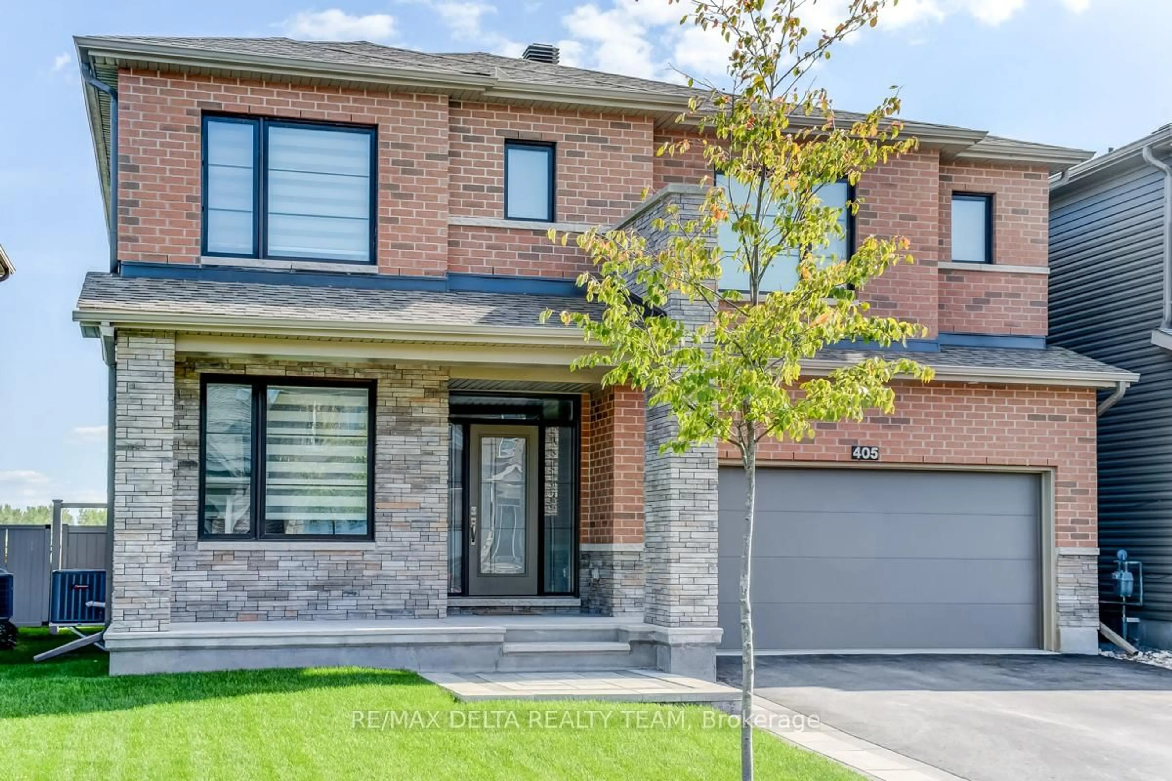 Home with brick exterior material, street for 405 Hepatica Way, Ottawa Ontario K4A 1G3