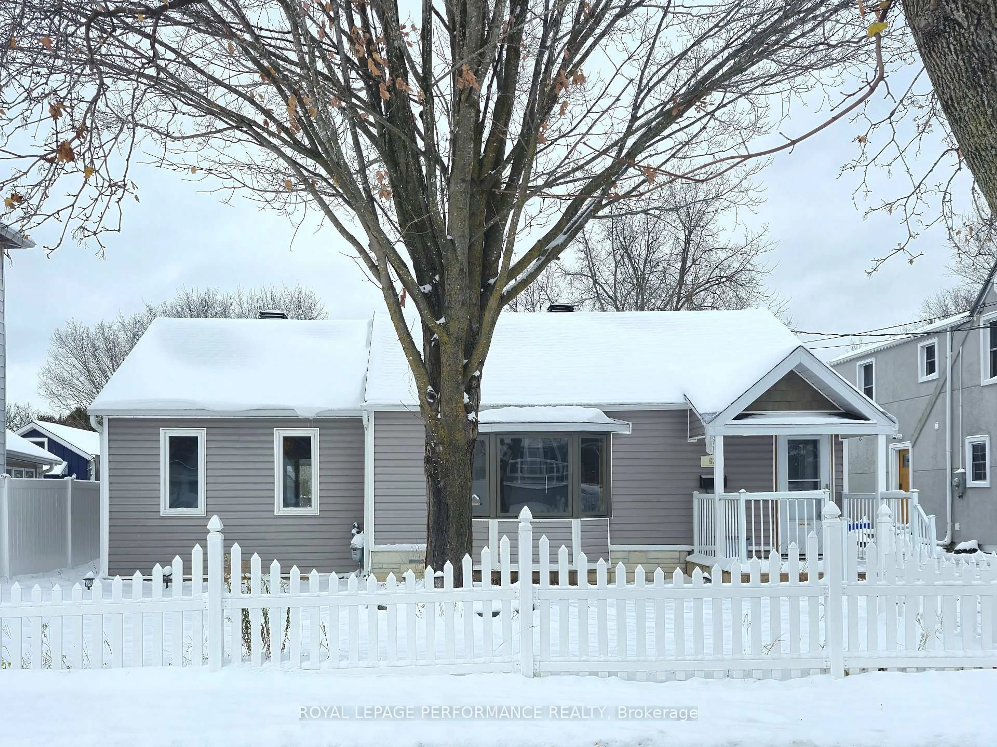 Home with vinyl exterior material, street for 63 Wilson St, Perth Ontario K7H 1M2
