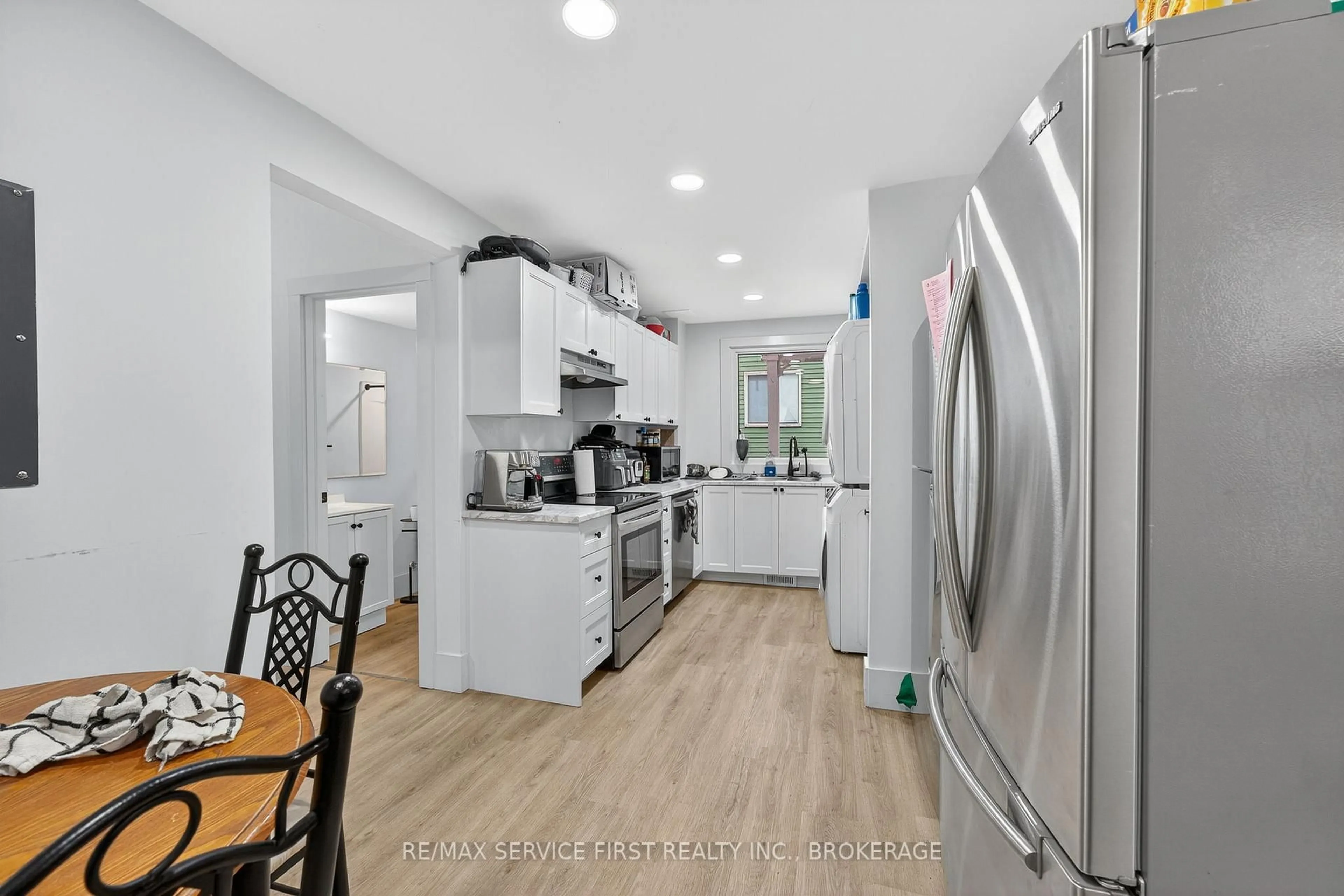 Open concept kitchen, ceramic/tile floor for 15 Foster St, Kingston Ontario K7M 6L2