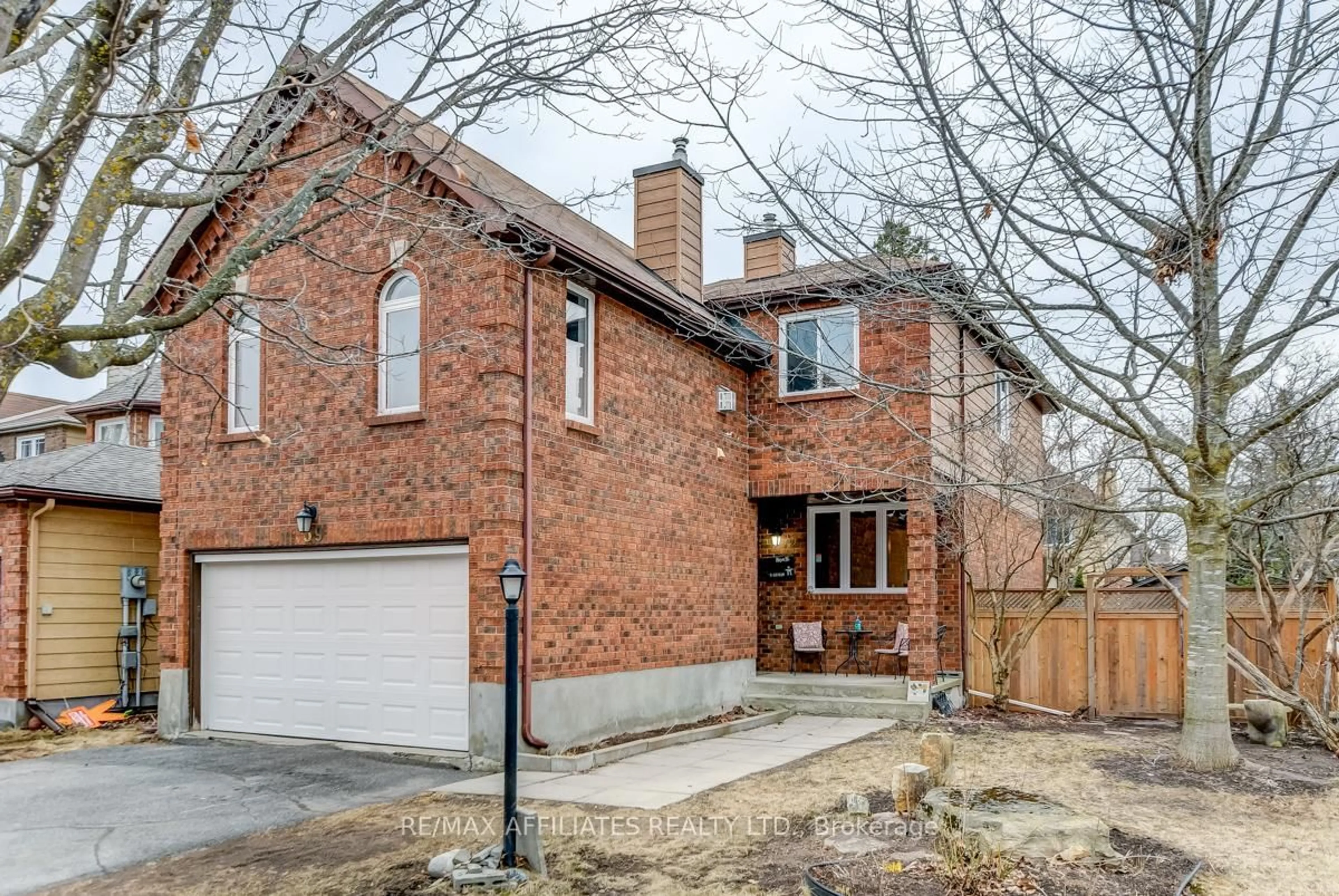 Home with brick exterior material, street for 39 INWOOD Dr, Kanata Ontario K2M 1Z3