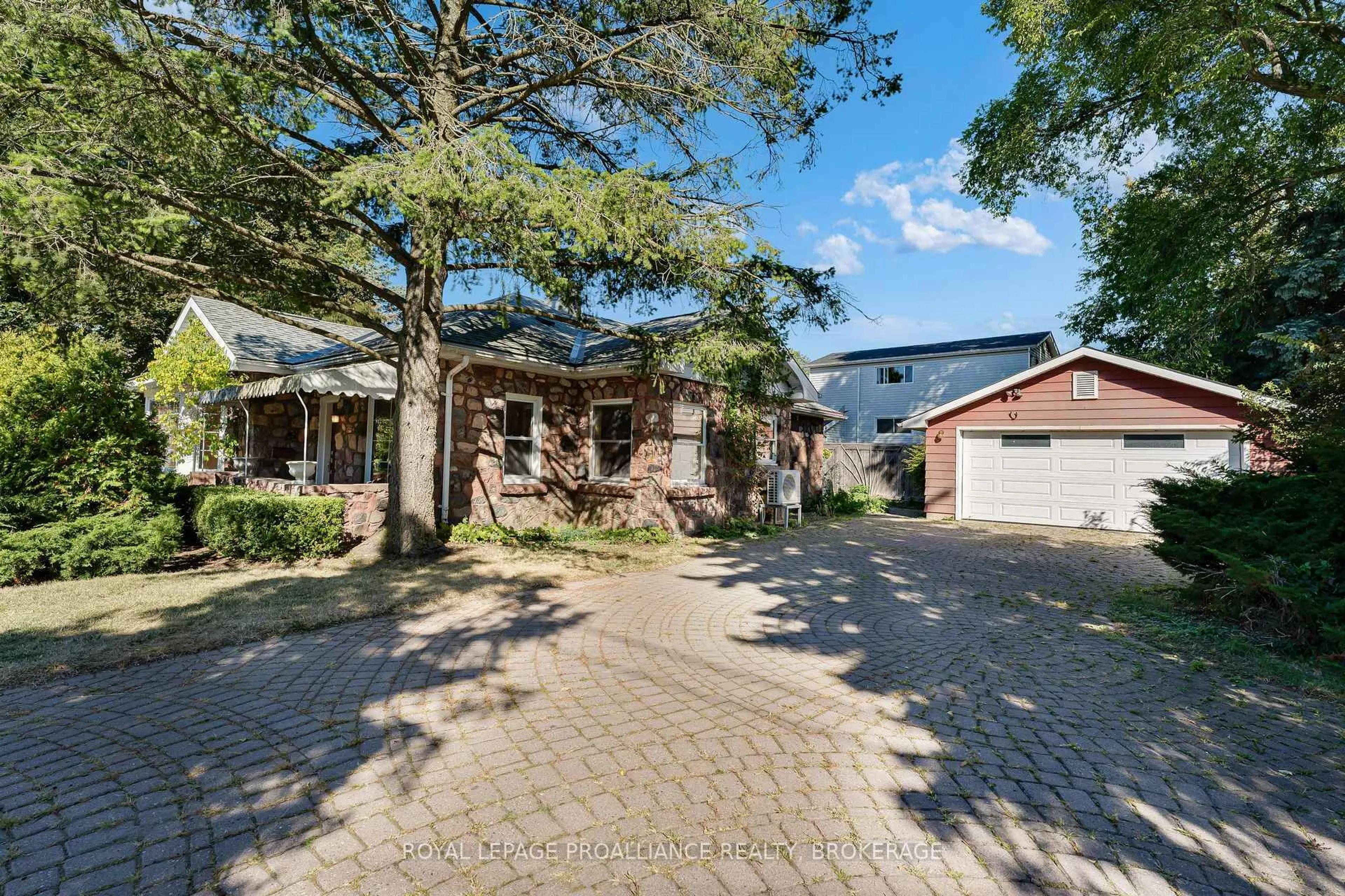 A pic from outside/outdoor area/front of a property/back of a property/a pic from drone, street for 235 Park St, Kingston Ontario K7L 1K4