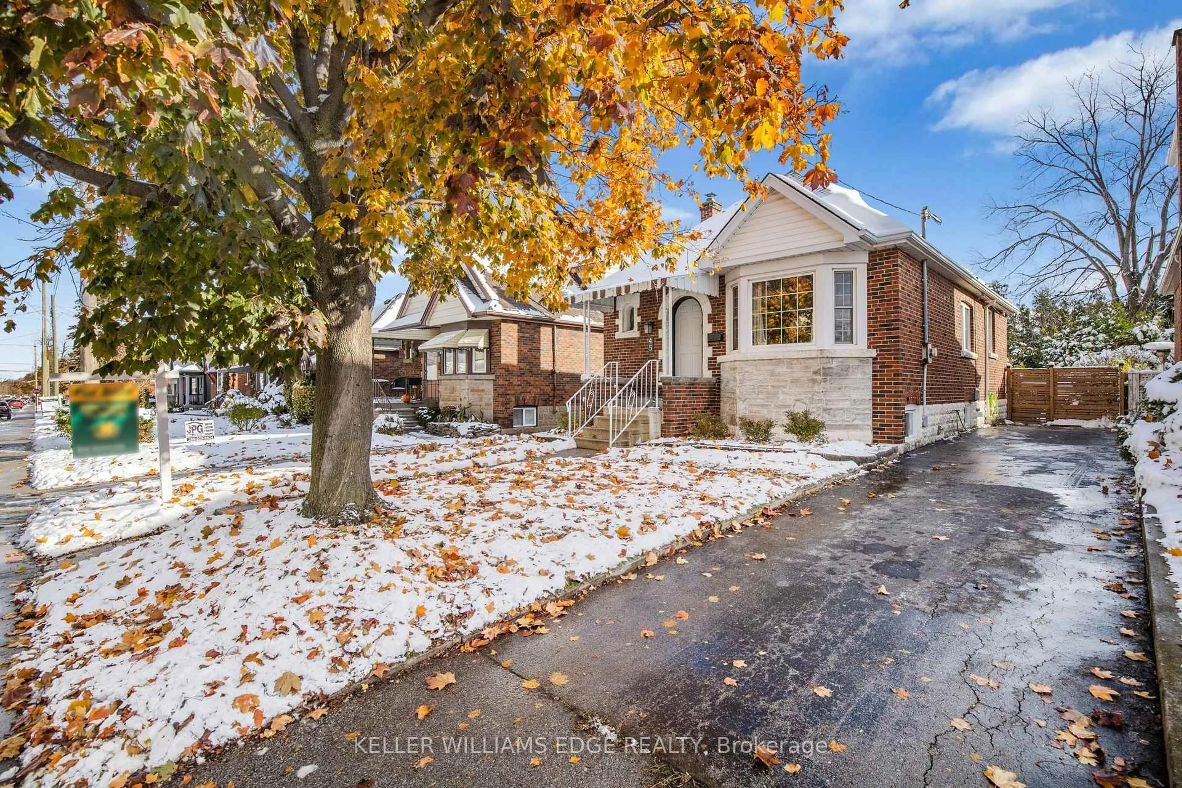 Home with brick exterior material, street for 45 Barons Ave, Hamilton Ontario L8K 2Y1