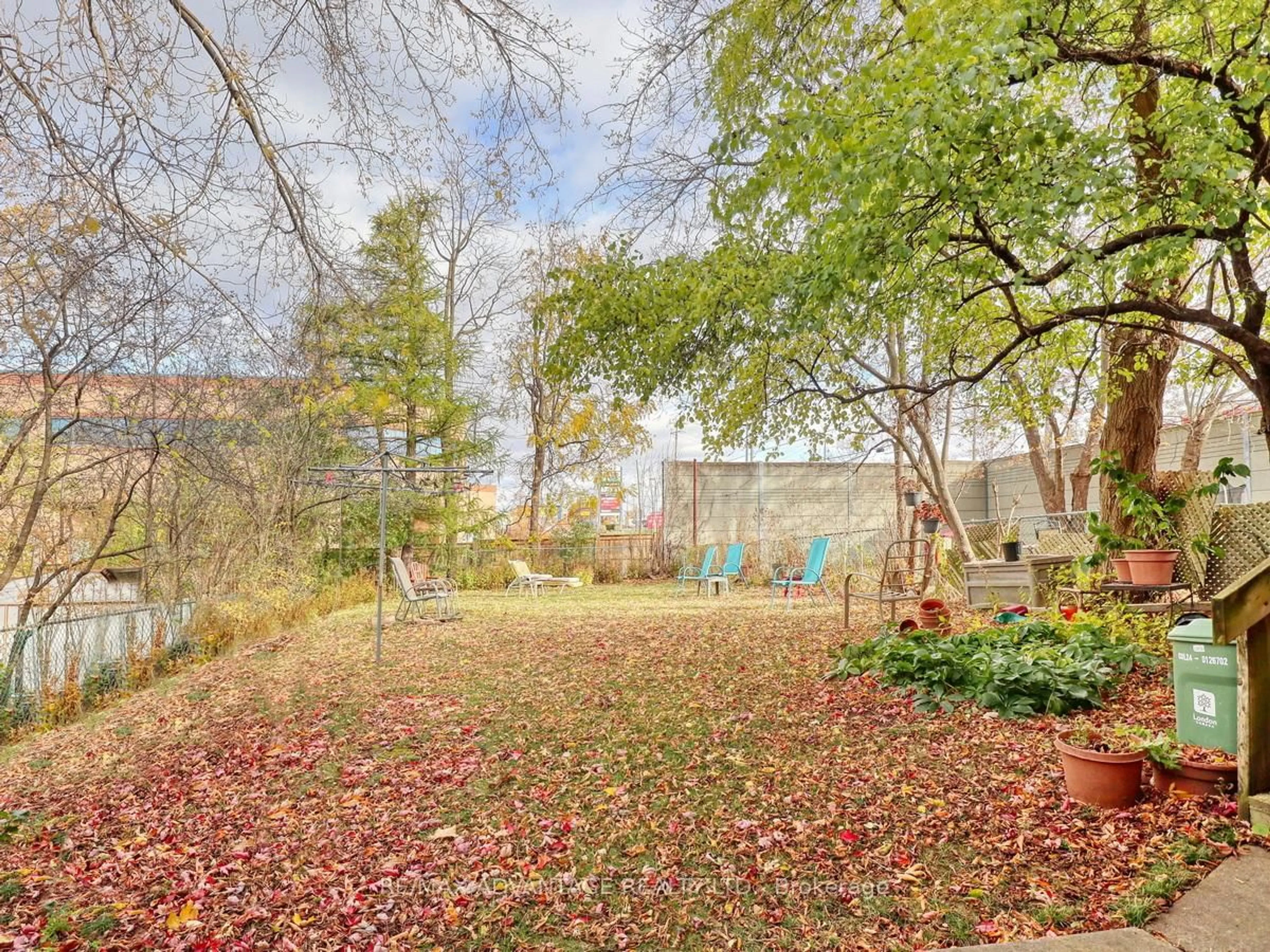 A pic from outside/outdoor area/front of a property/back of a property/a pic from drone, forest/trees view for 38A & 38B Adare Cres, London South Ontario N6C 2S7