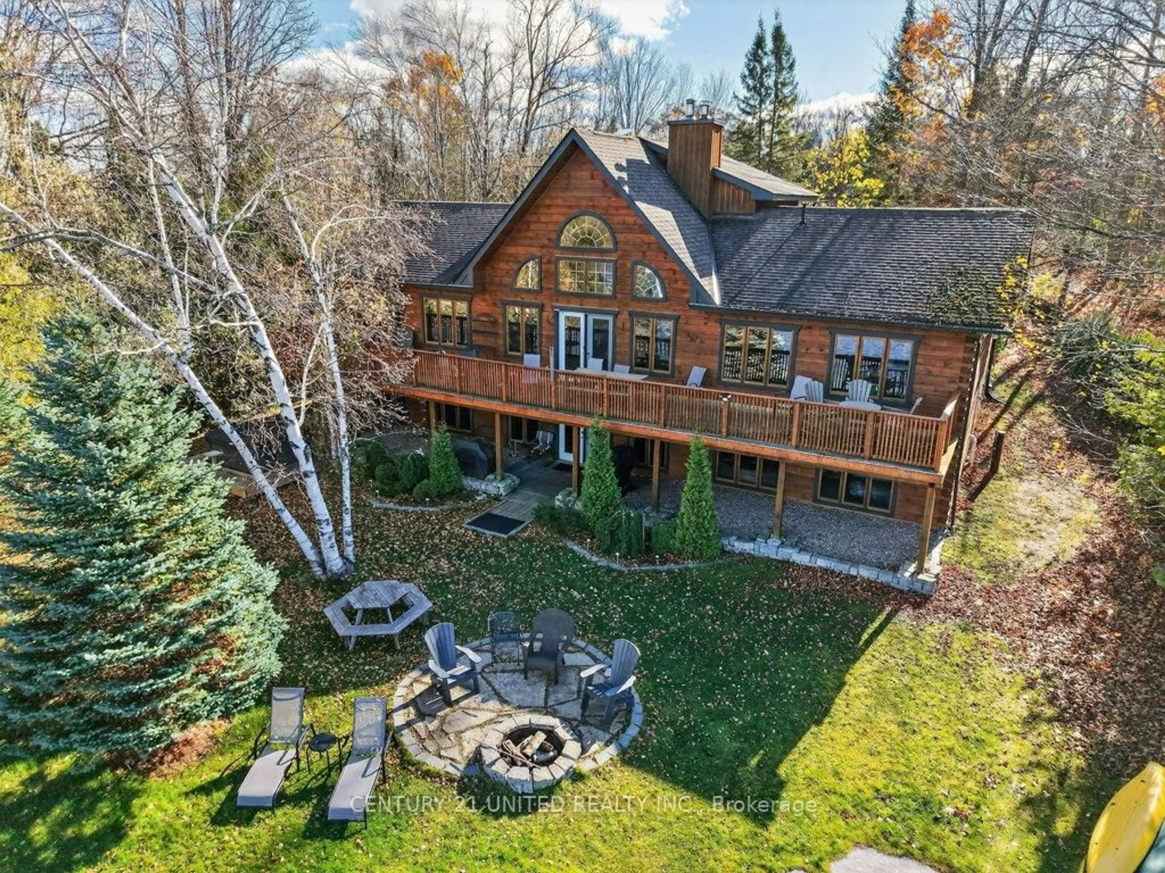 A pic from outside/outdoor area/front of a property/back of a property/a pic from drone, water/lake/river/ocean view for 2 Darvell Lane, Trent Lakes Ontario K0L 1J0