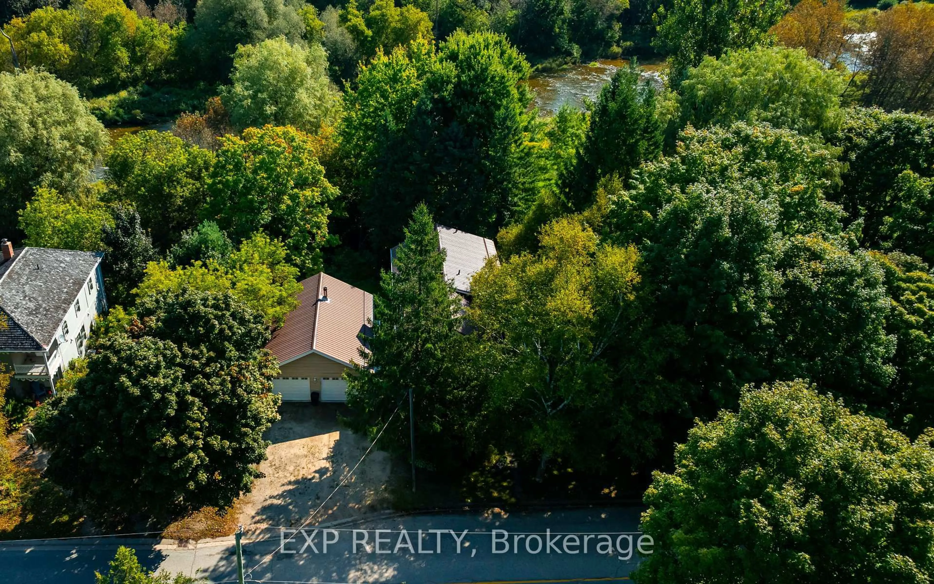 A pic from outside/outdoor area/front of a property/back of a property/a pic from drone, forest/trees view for 16 Mill St, Amaranth Ontario L9W 3Z3