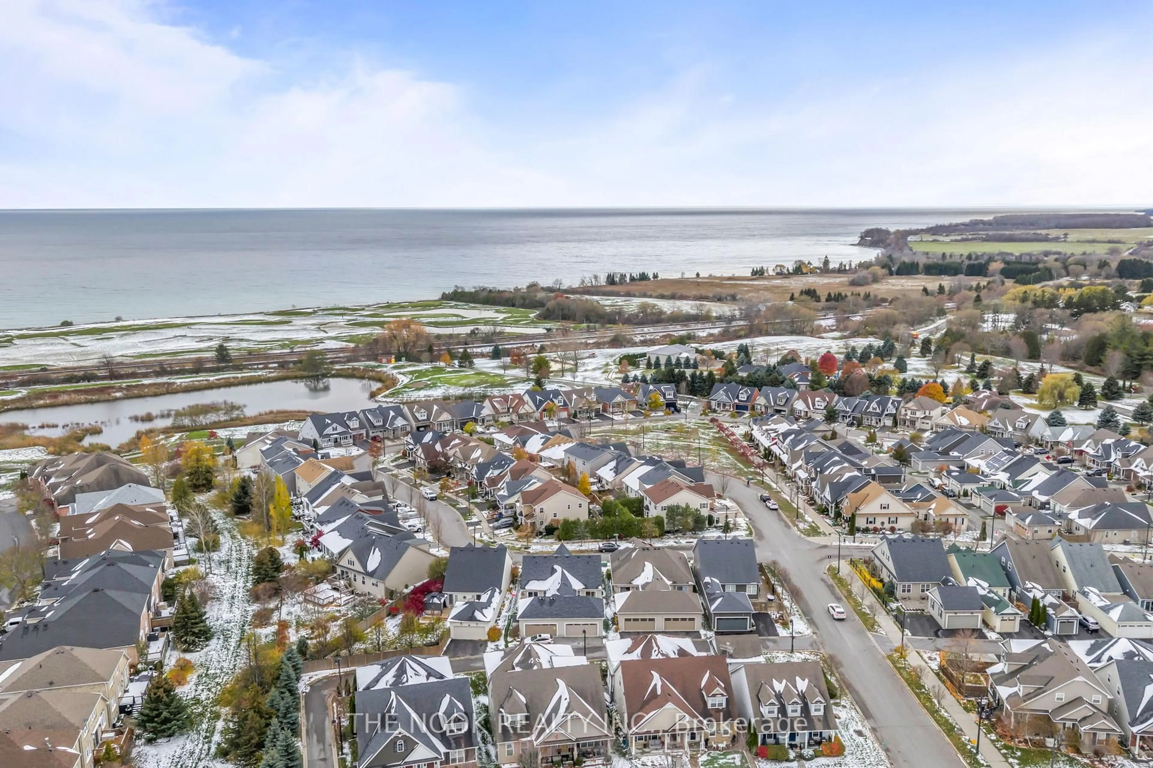 A pic from outside/outdoor area/front of a property/back of a property/a pic from drone, water/lake/river/ocean view for 7 Greenaway Circ, Port Hope Ontario L1A 0B9