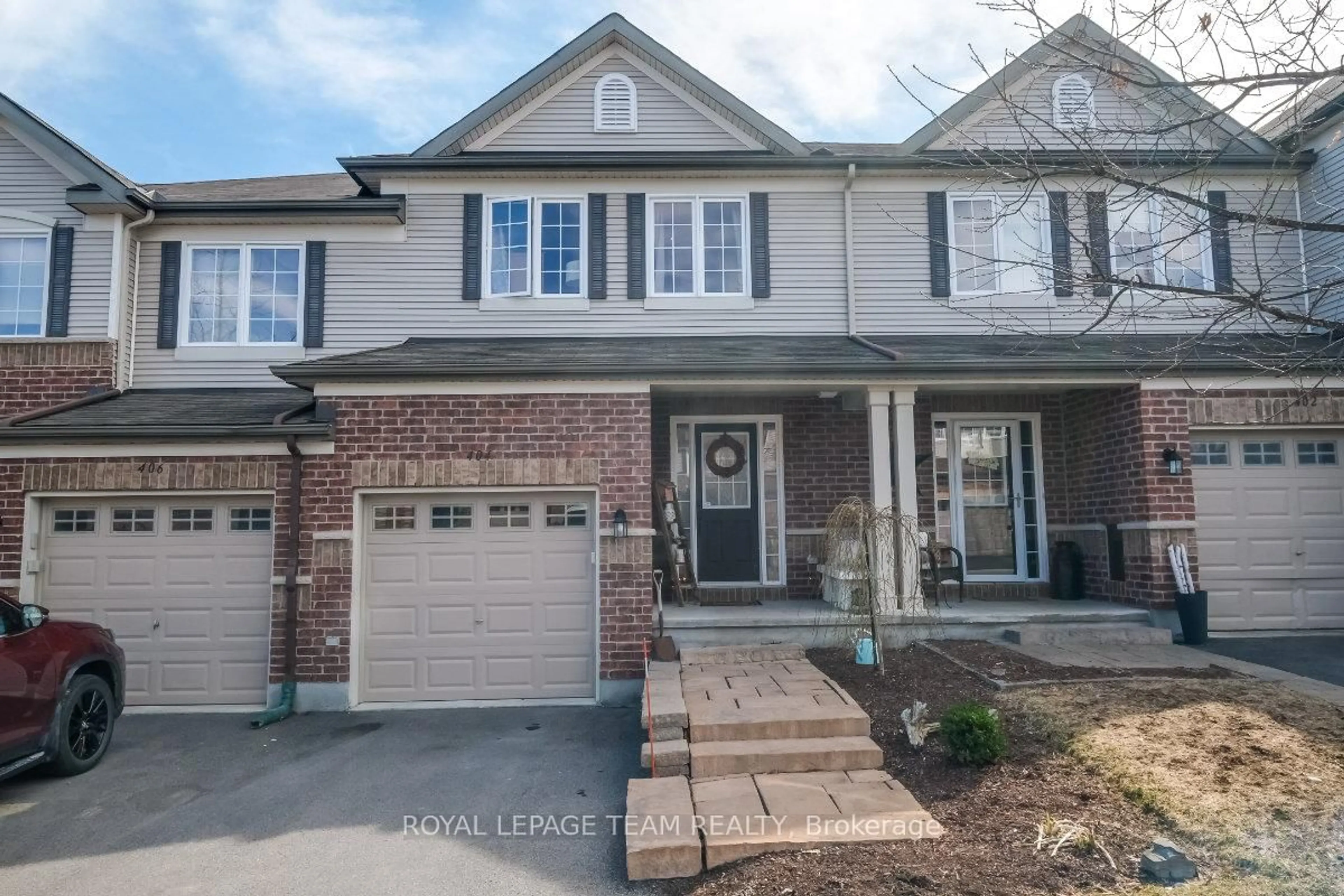 Home with brick exterior material, street for 404 Heathrow Private, Stittsville Ontario K2S 0M9
