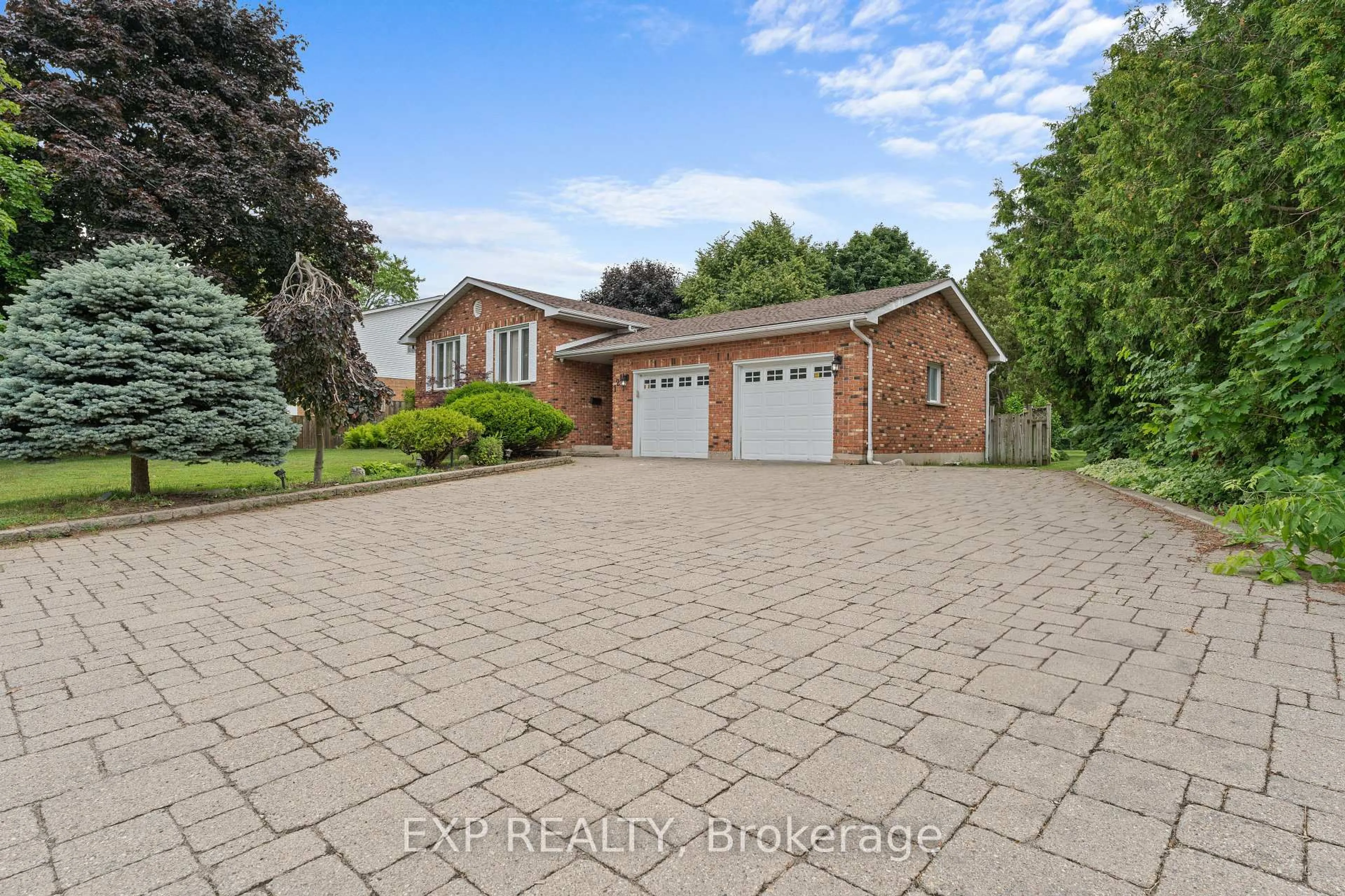 Home with brick exterior material, street for 121 TollGate Rd, Brantford Ontario N3R 4Z9