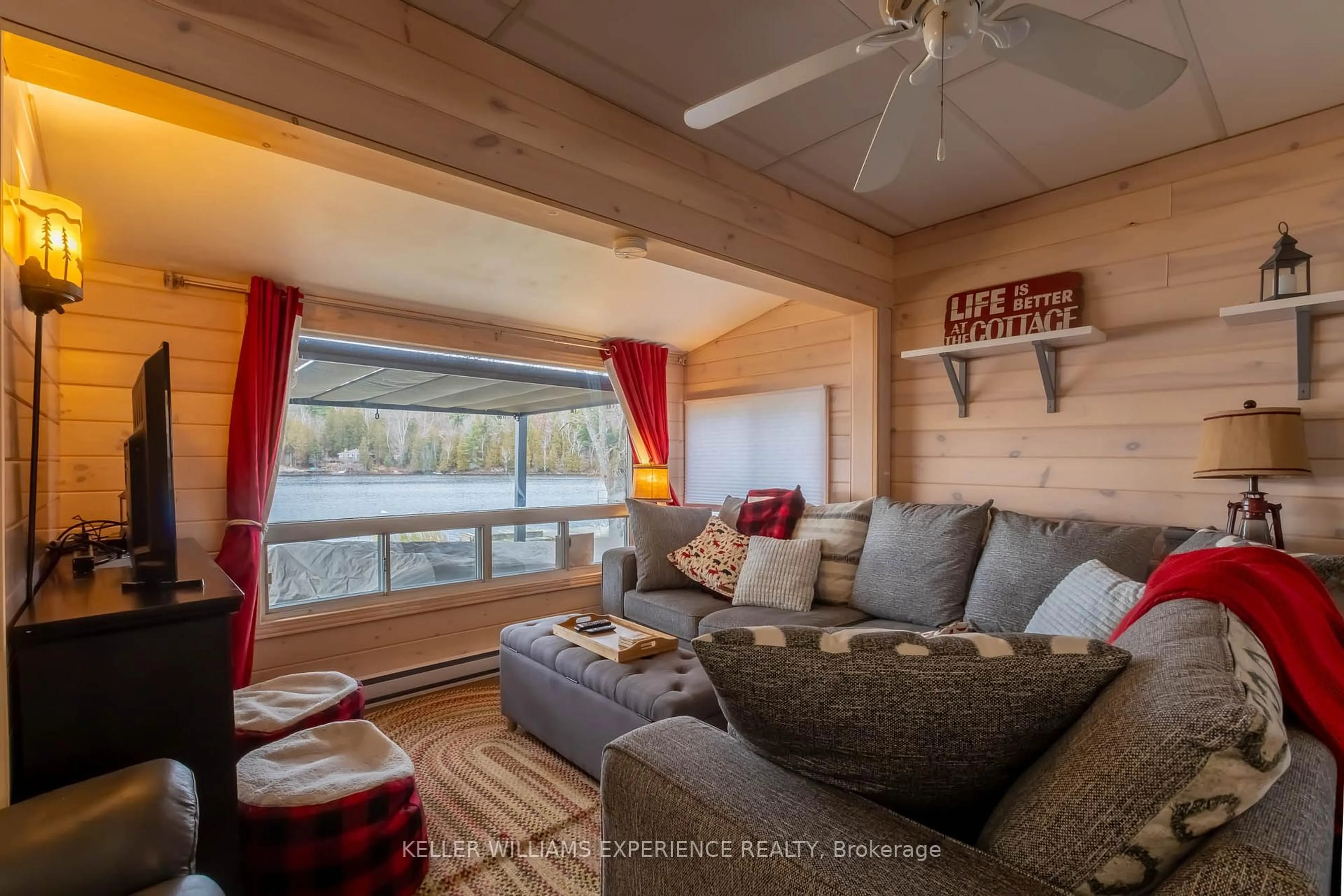 Living room with furniture, wood/laminate floor for 477 C Star Lake Rd, Seguin Ontario P0C 1J0