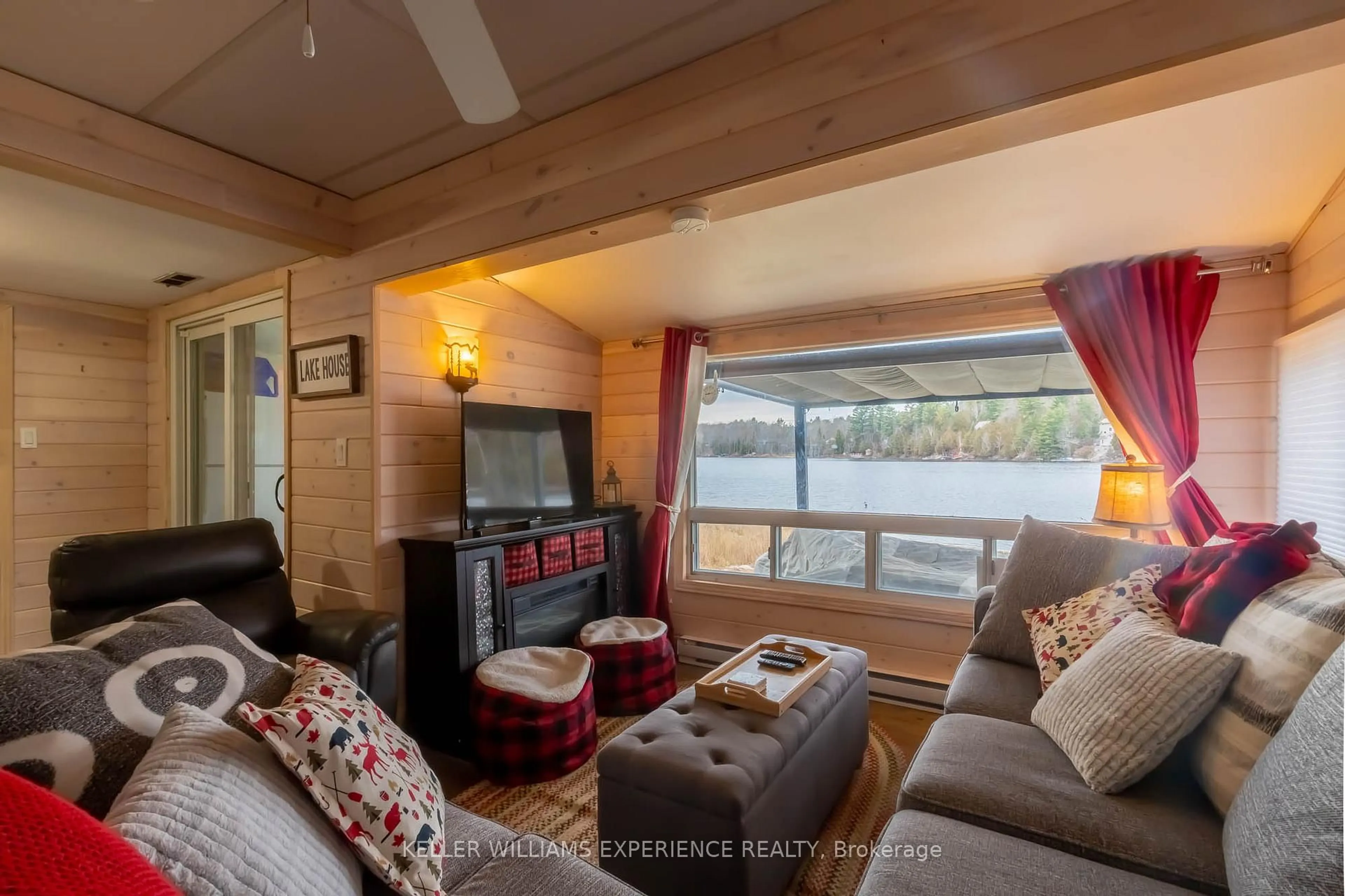 Living room with furniture, wood/laminate floor for 477 C Star Lake Rd, Seguin Ontario P0C 1J0