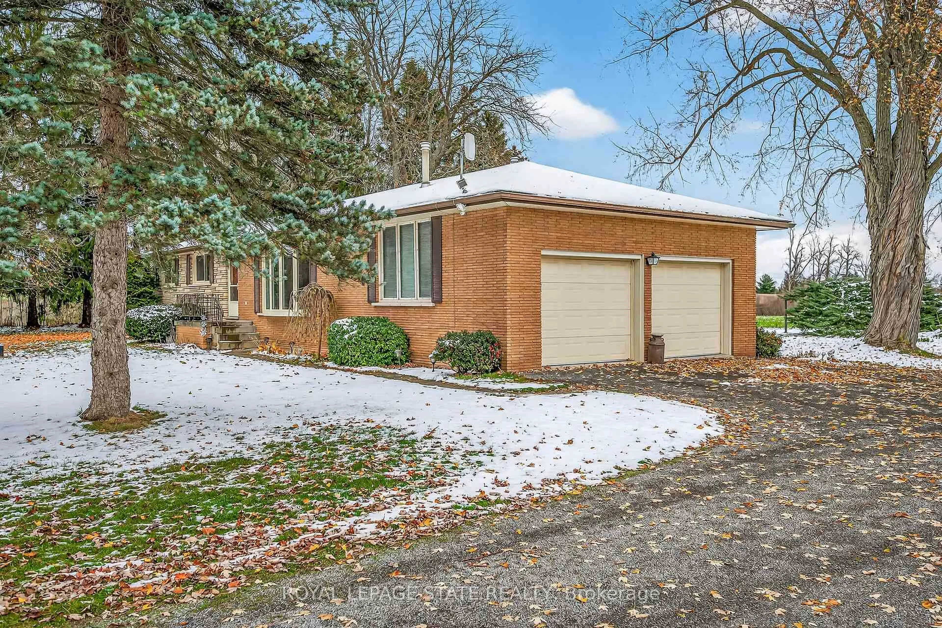 Home with brick exterior material, street for 580 woodhill Rd, Hamilton Ontario L0R 2B0