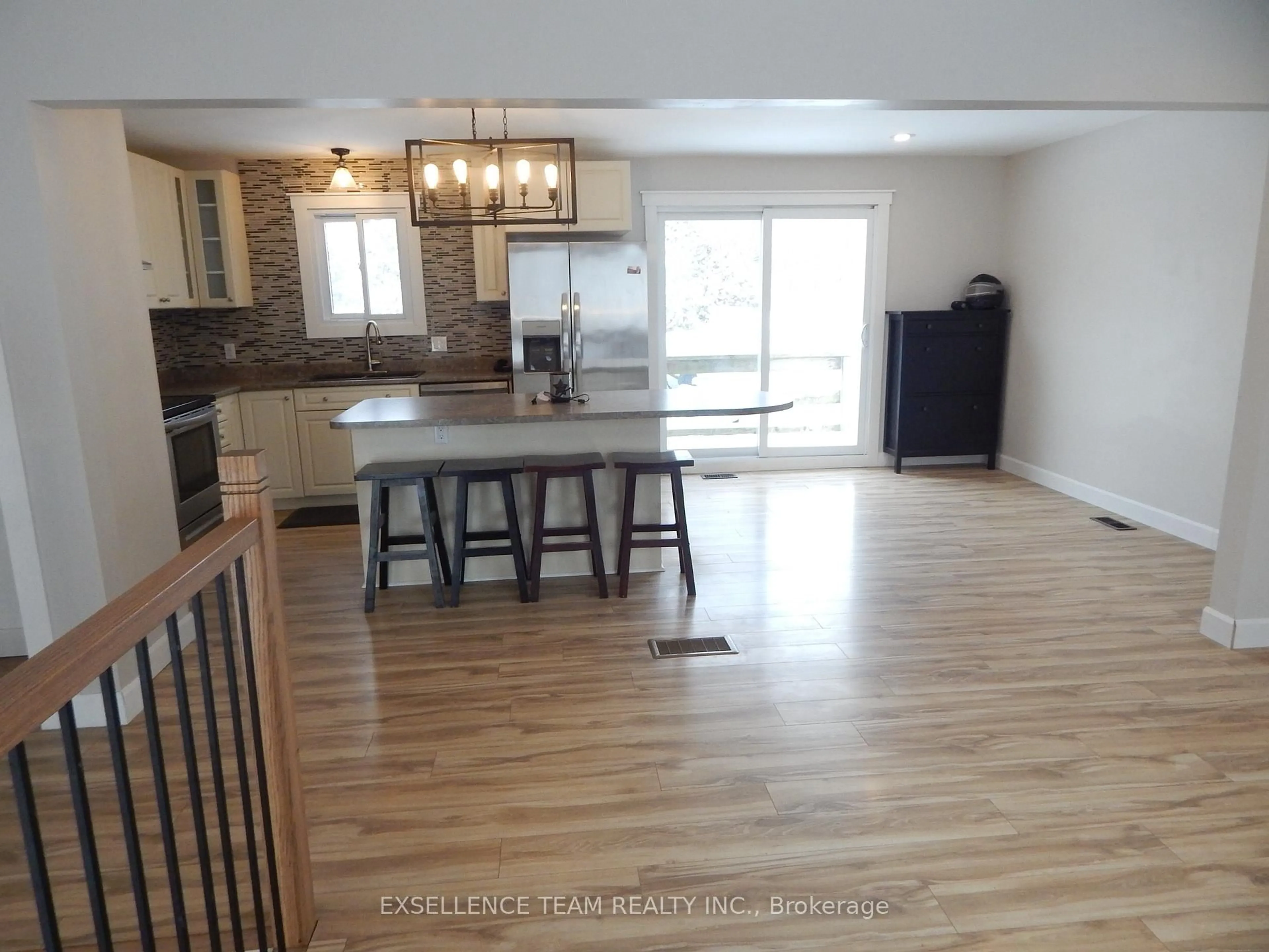 Open concept kitchen, wood/laminate floor for 17015 Chevrier St, North Stormont Ontario K0C 1V0