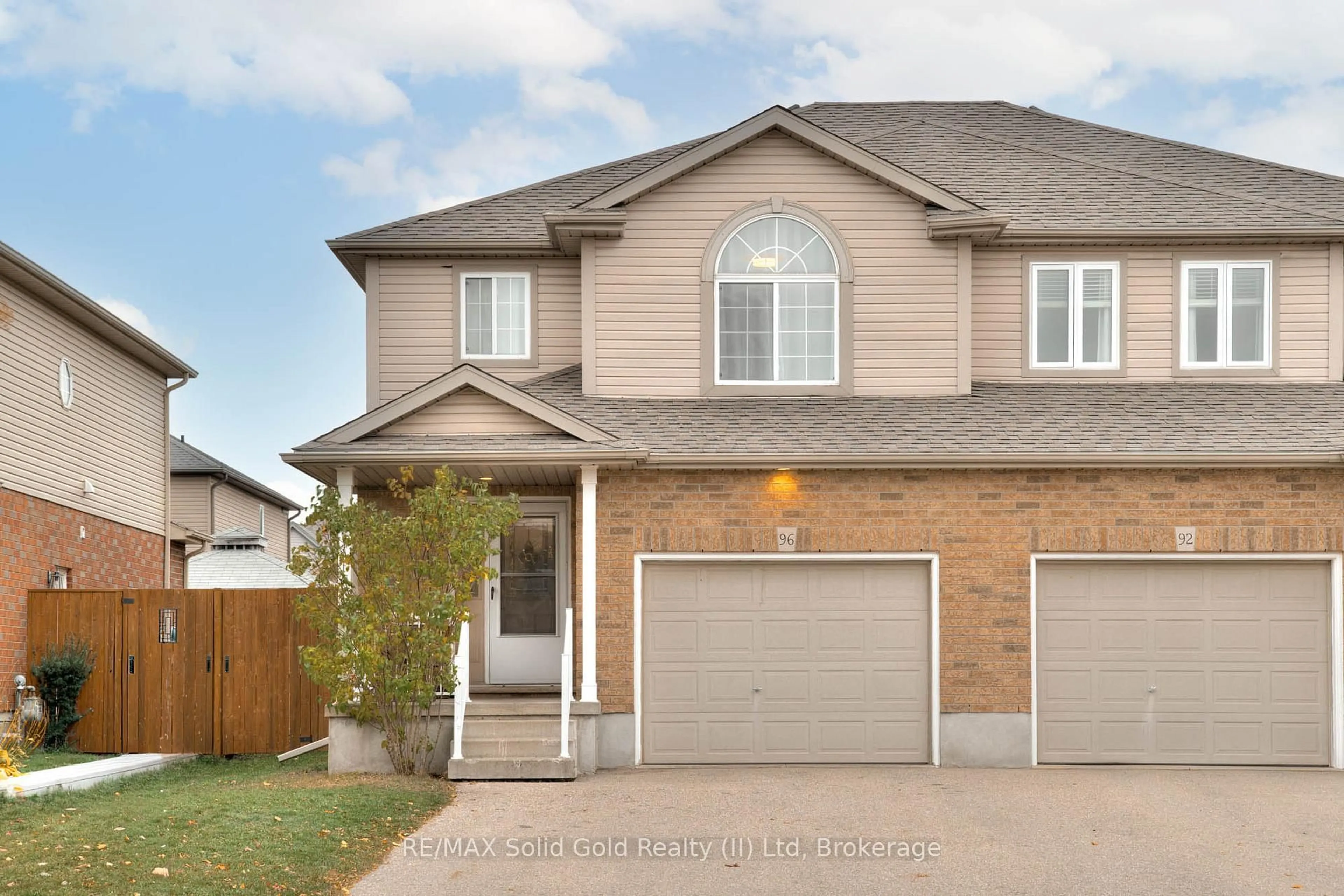 Home with brick exterior material, street for 96 Raising Mill Gate, Waterloo Ontario N3B 3N5