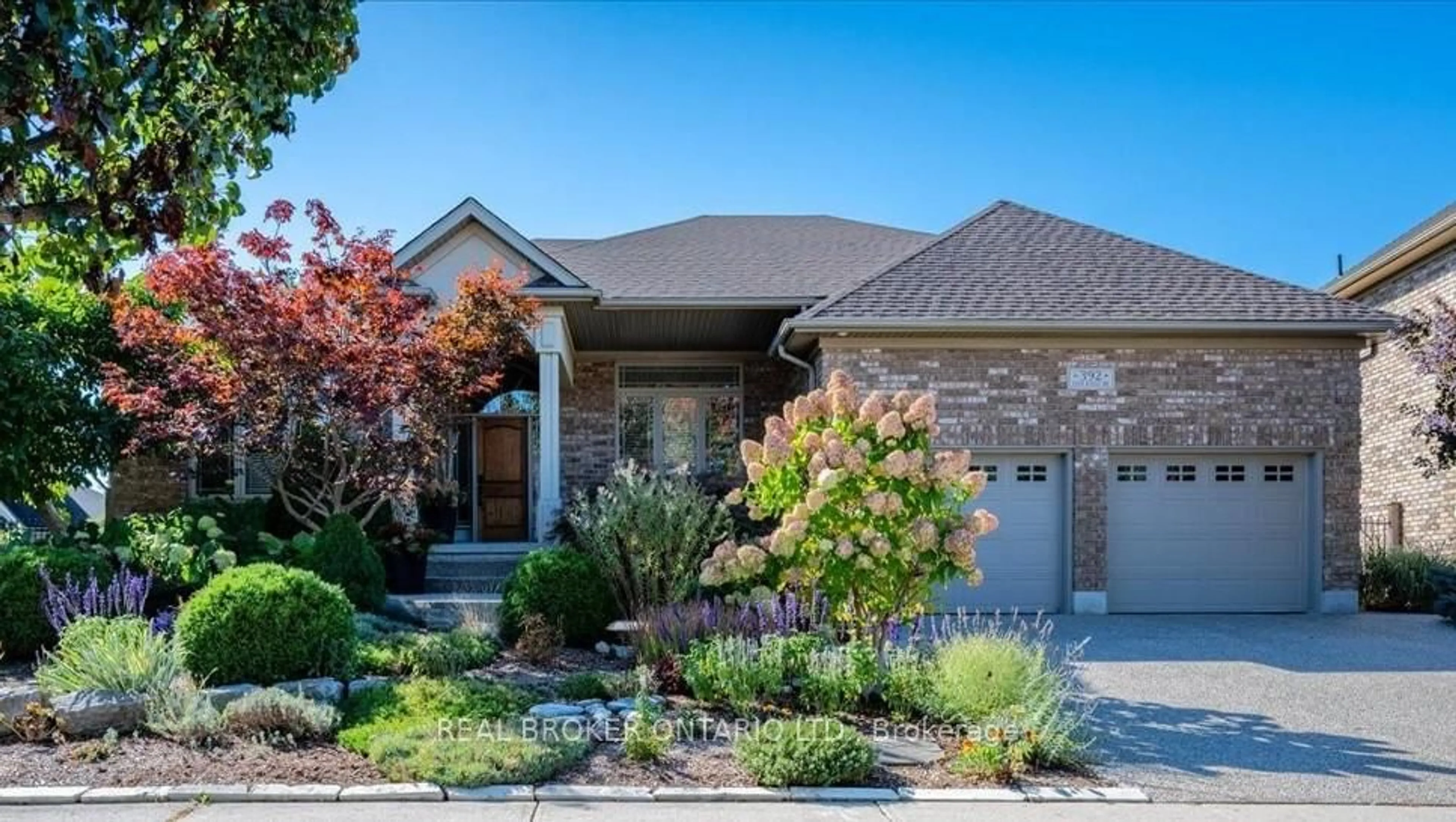 Home with brick exterior material, street for 392 Deer Ridge Dr, Kitchener Ontario N2P 2S6