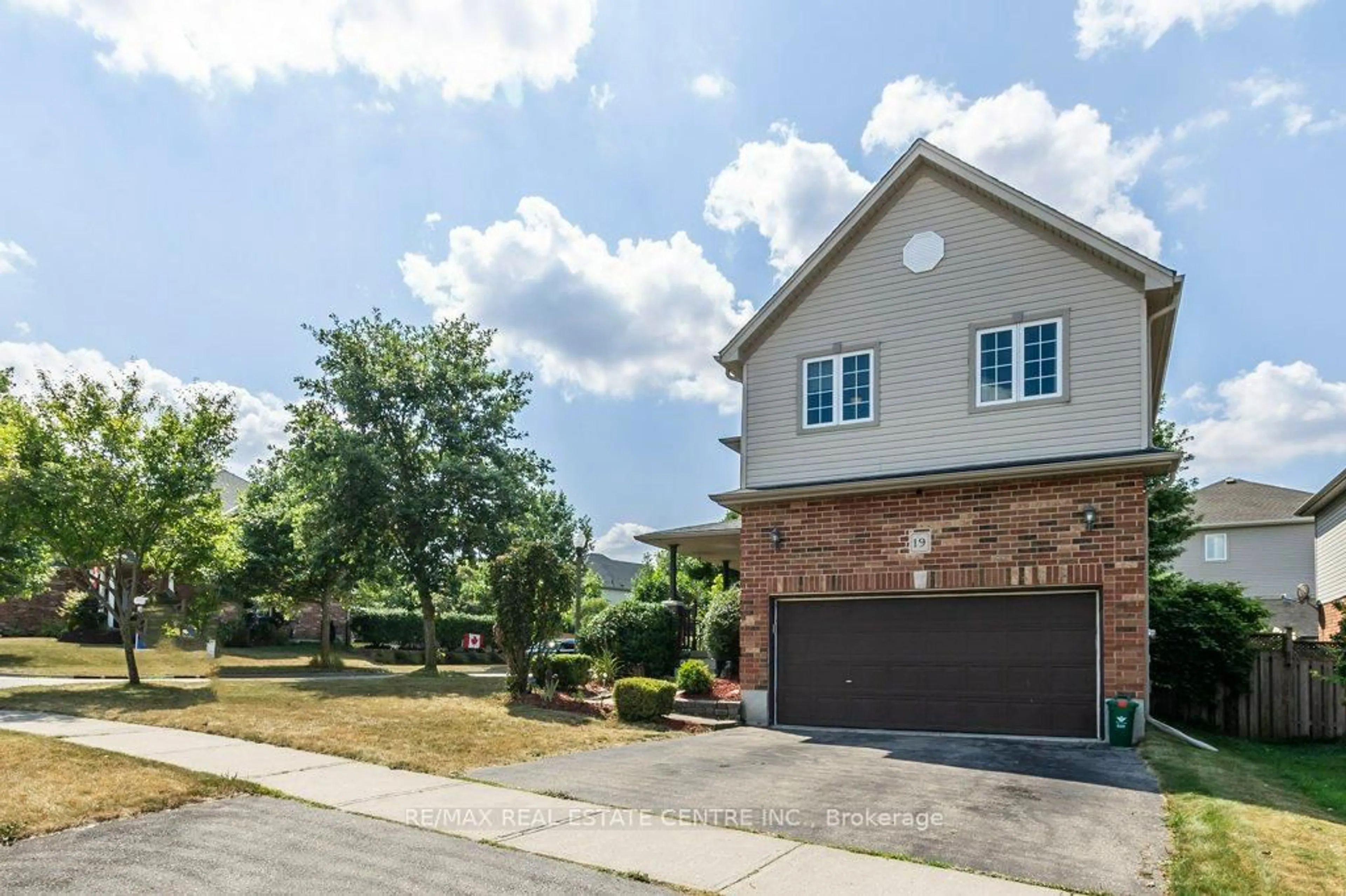 Home with brick exterior material, street for 19 Apple Ridge Dr, Kitchener Ontario N2P 2S2