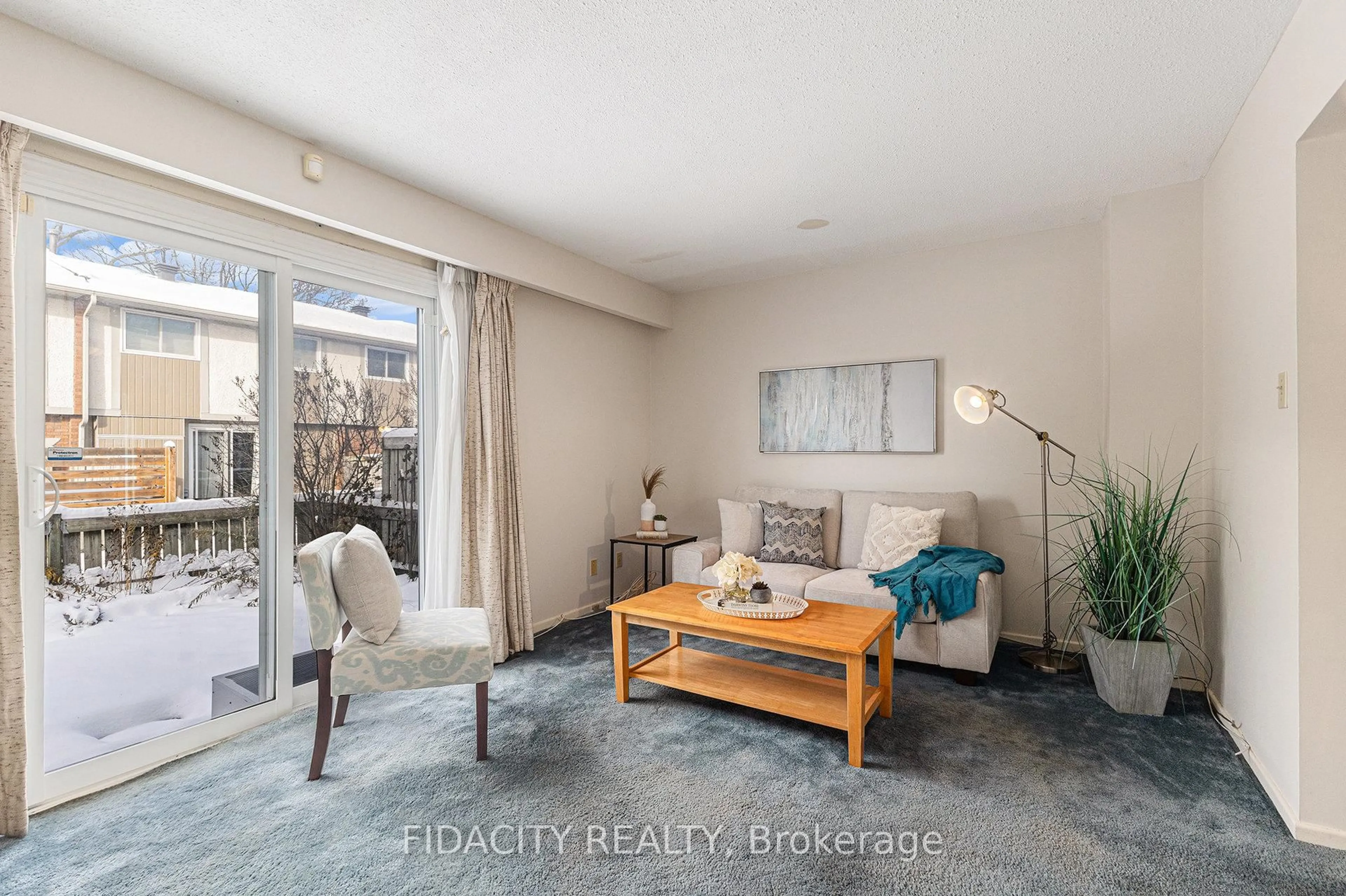 Living room with furniture, unknown for 477 Moodie Dr #C, Ottawa Ontario K2H 8T7