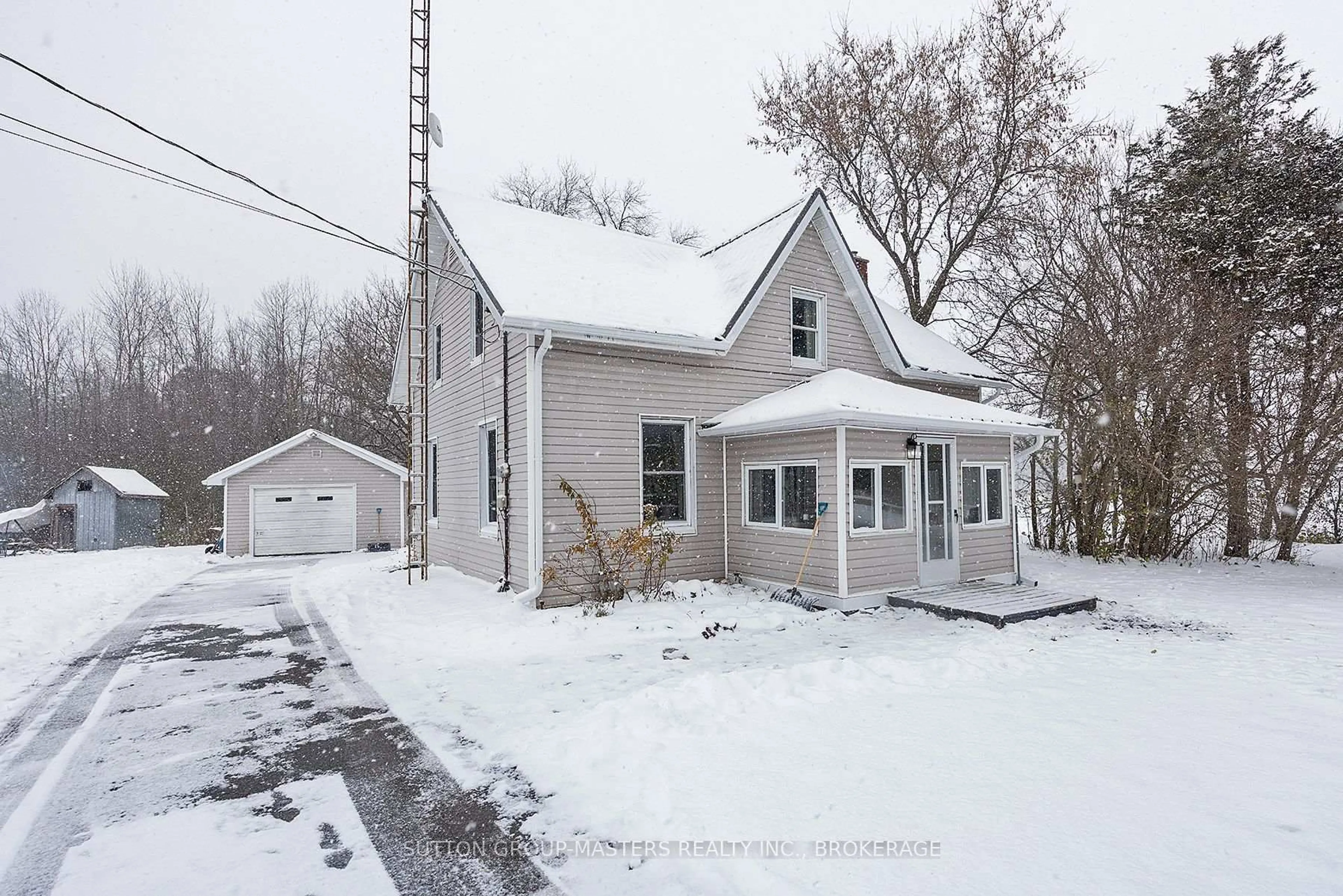 A pic from outside/outdoor area/front of a property/back of a property/a pic from drone, street for 3481 Wilton Rd, Harrowsmith Ontario K0H 1V0