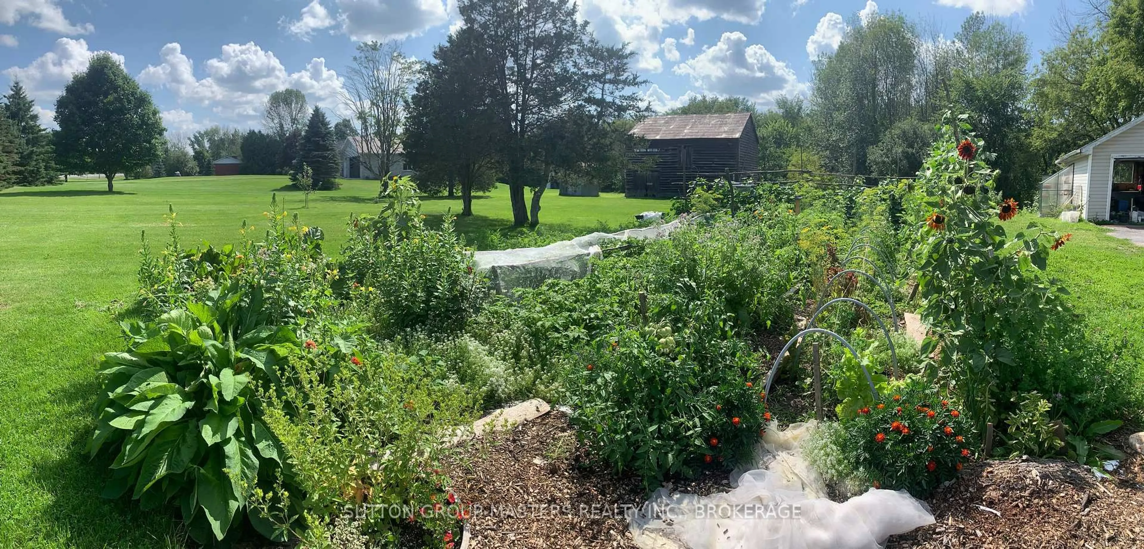 A pic from outside/outdoor area/front of a property/back of a property/a pic from drone, unknown for 3481 Wilton Rd, Harrowsmith Ontario K0H 1V0